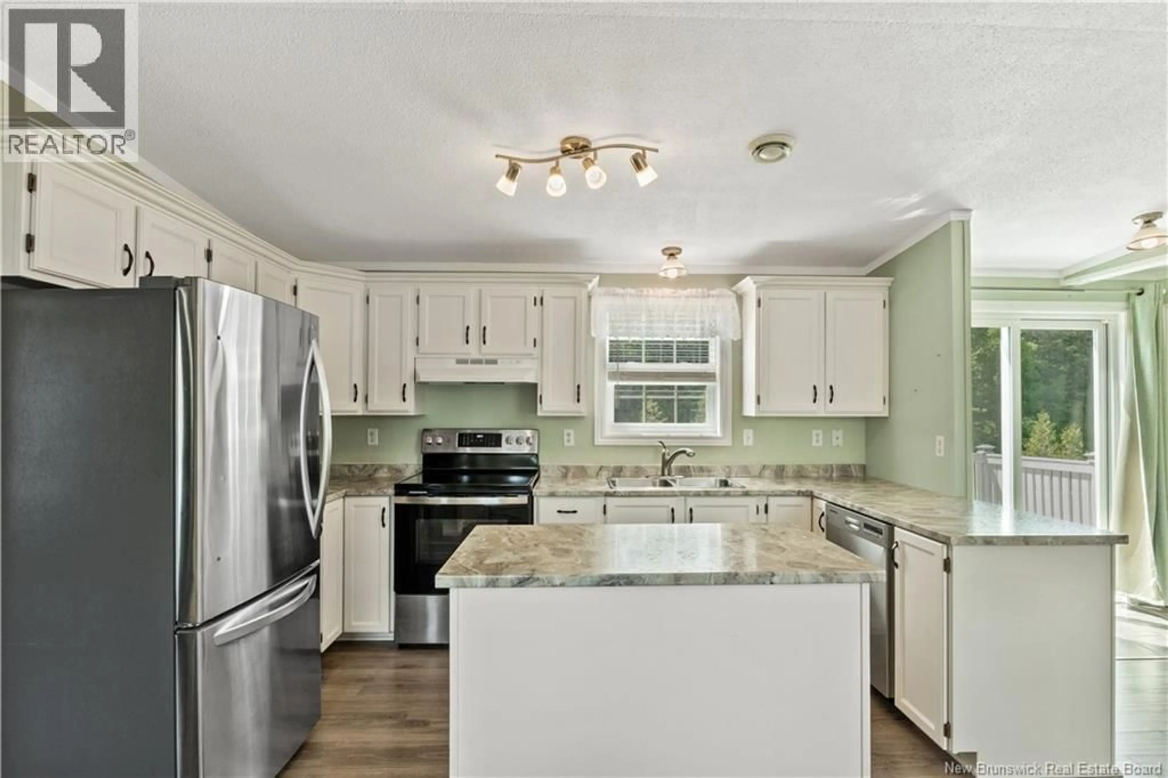 Open concept kitchen, ceramic/tile floor for 179 ULYSSE, Dieppe New Brunswick E1A7G5