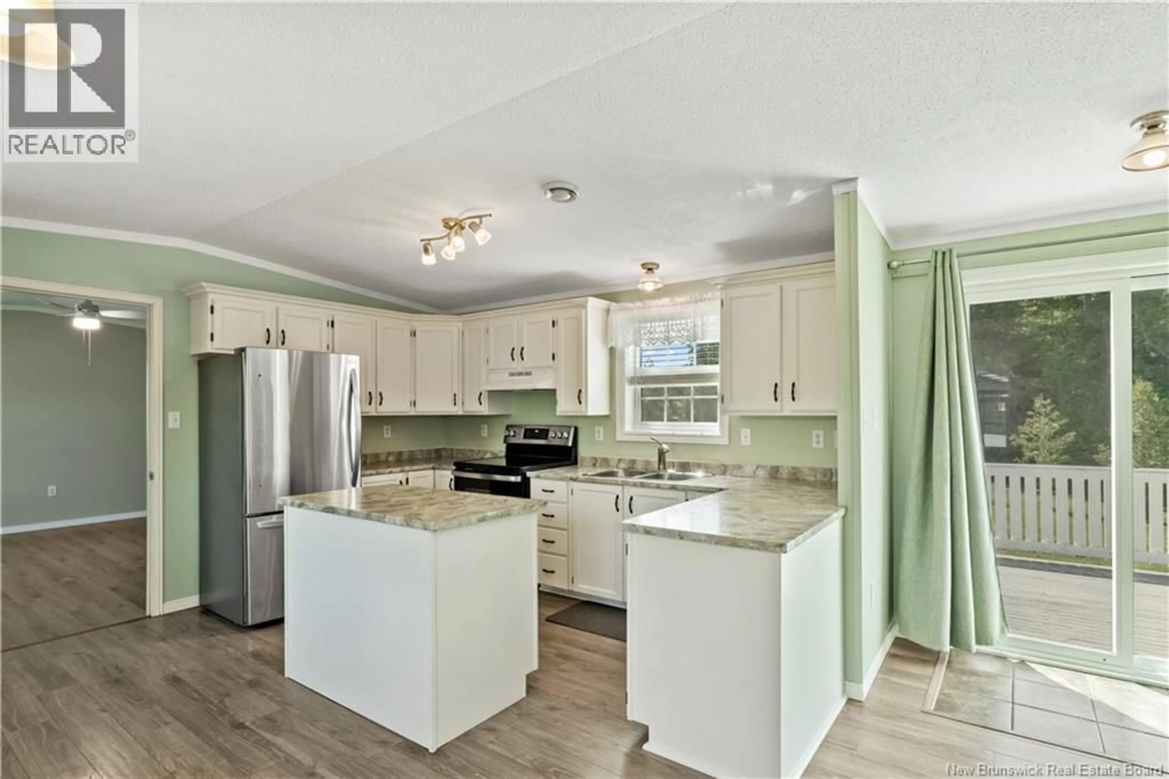 Open concept kitchen, ceramic/tile floor for 179 ULYSSE, Dieppe New Brunswick E1A7G5