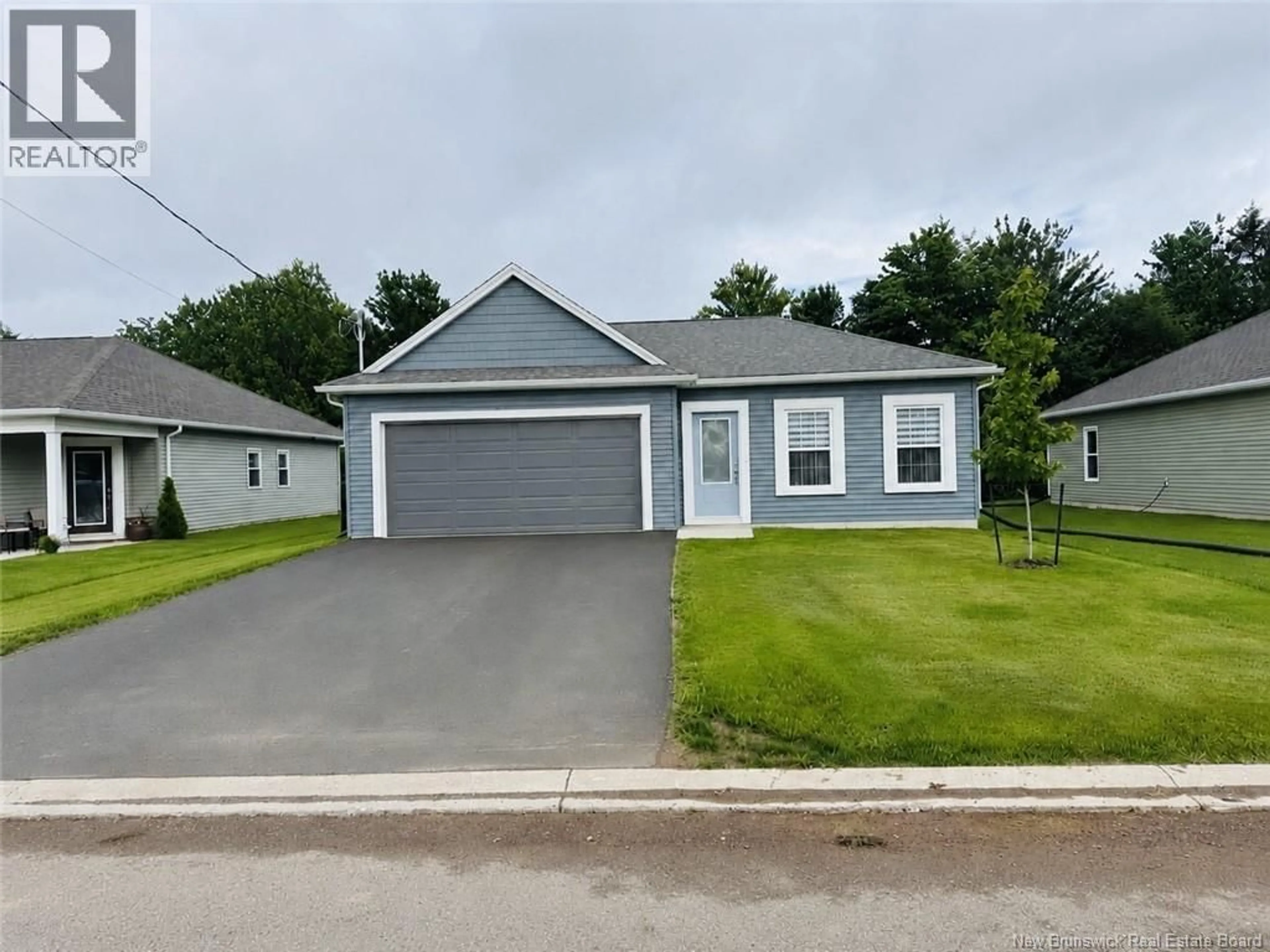 Home with vinyl exterior material, street for 49 HUGH CRESCENT, Sussex Corner New Brunswick E4E2M1