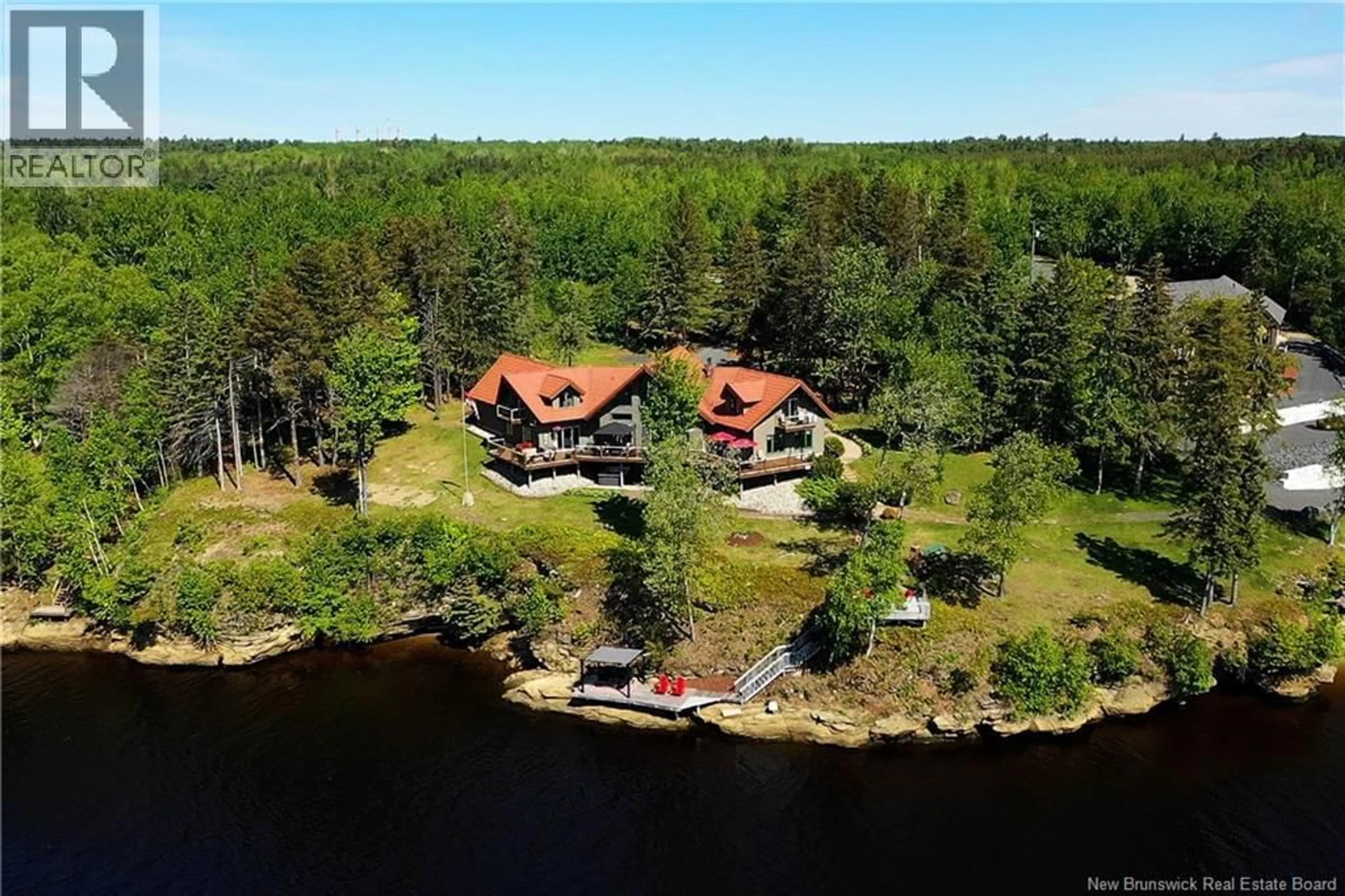 A pic from outside/outdoor area/front of a property/back of a property/a pic from drone, water/lake/river/ocean view for 30 ROCKCLIFF BOULEVARD, Miramichi New Brunswick E1V3C5