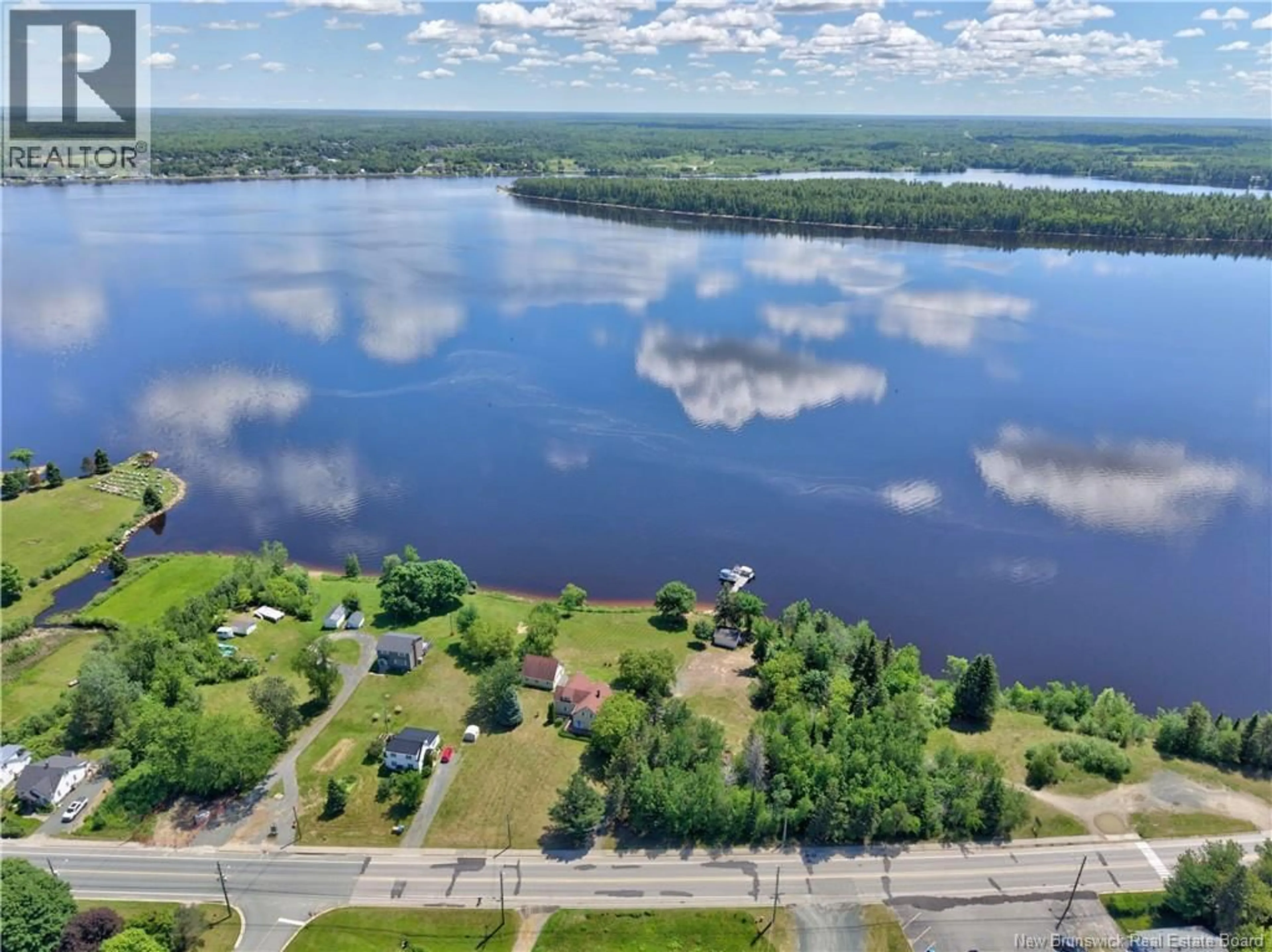 A pic from outside/outdoor area/front of a property/back of a property/a pic from drone, water/lake/river/ocean view for 280 KING GEORGE HWY, Miramichi New Brunswick E1V1K9