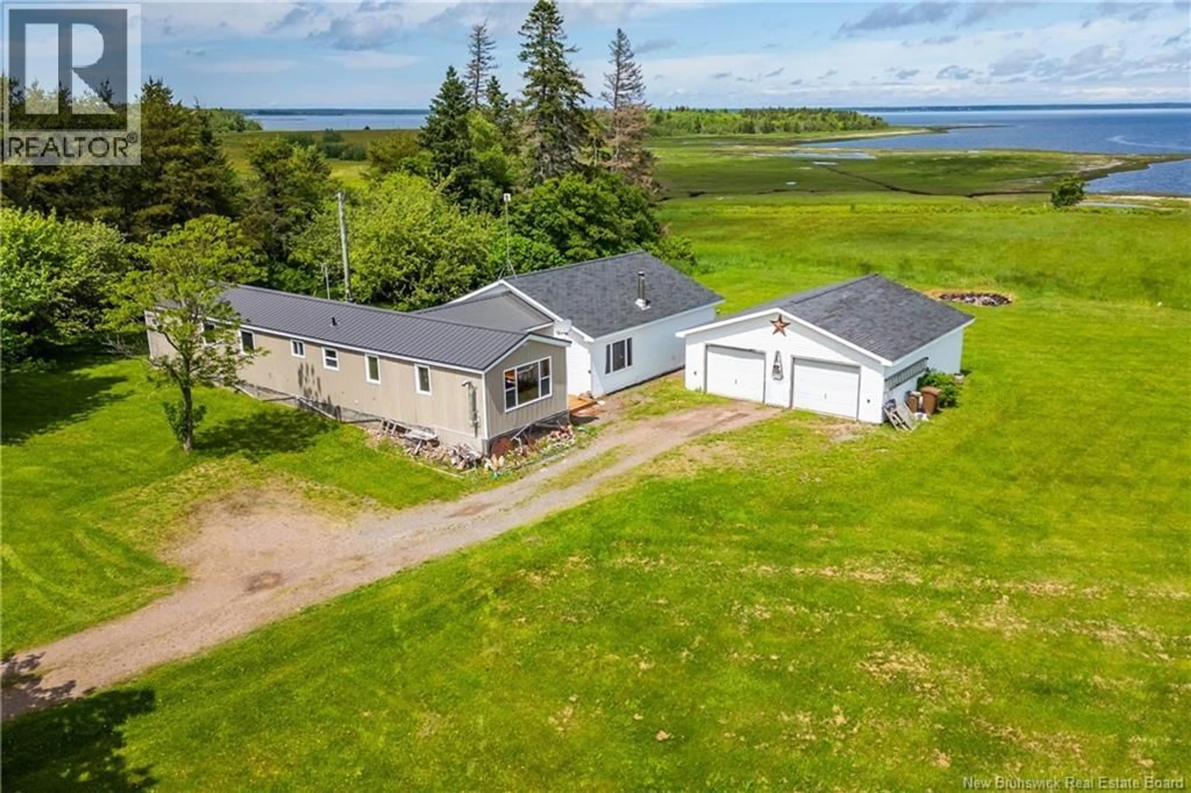 A pic from outside/outdoor area/front of a property/back of a property/a pic from drone, water/lake/river/ocean view for 708 ROUTE 970, Baie Verte New Brunswick E4M1Y5