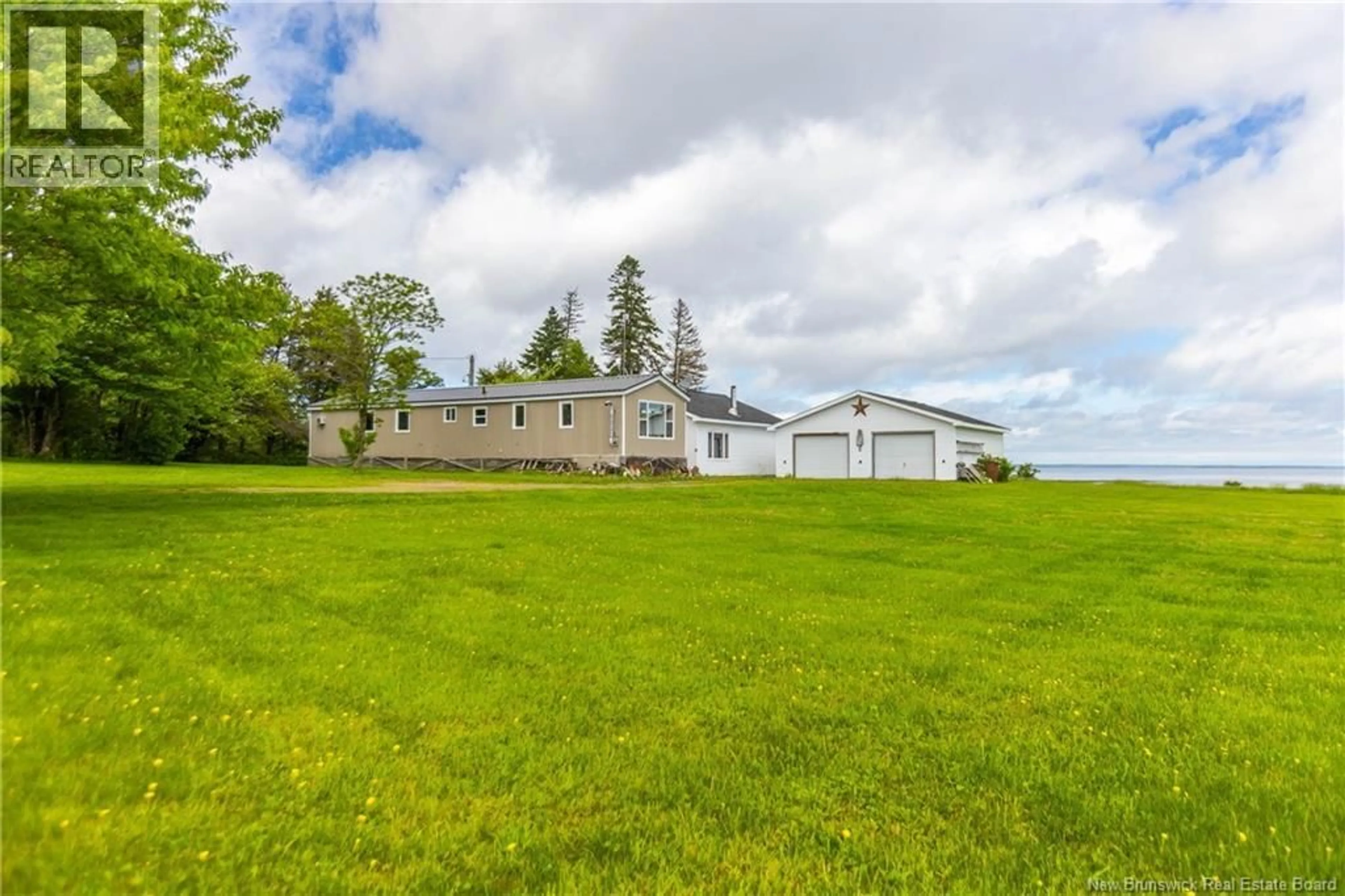 A pic from outside/outdoor area/front of a property/back of a property/a pic from drone, water/lake/river/ocean view for 708 ROUTE 970, Baie Verte New Brunswick E4M1Y5