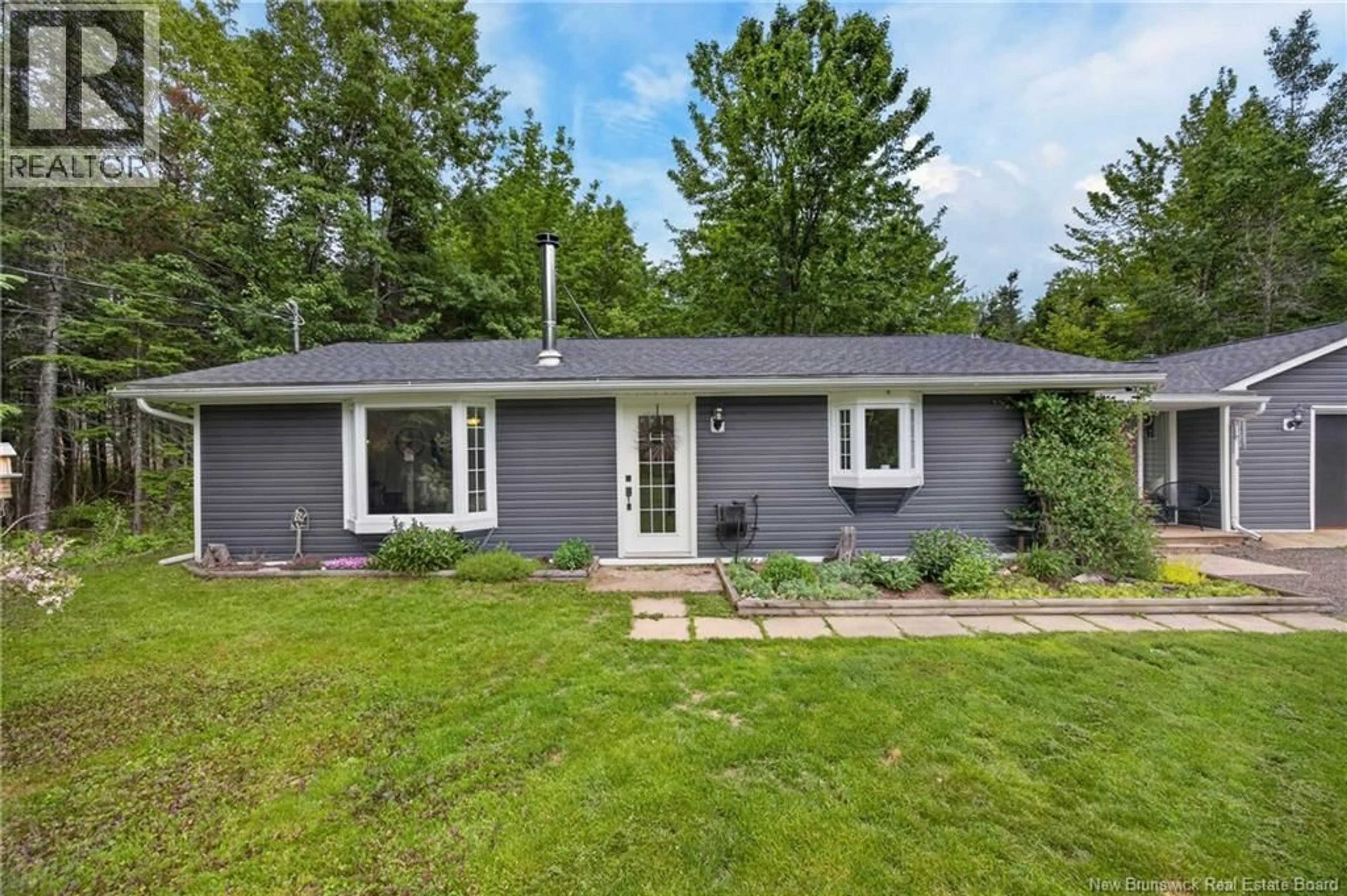 Home with vinyl exterior material, street for 148 JERRY CHESSIE ROAD, Hanwell New Brunswick E6K3B4