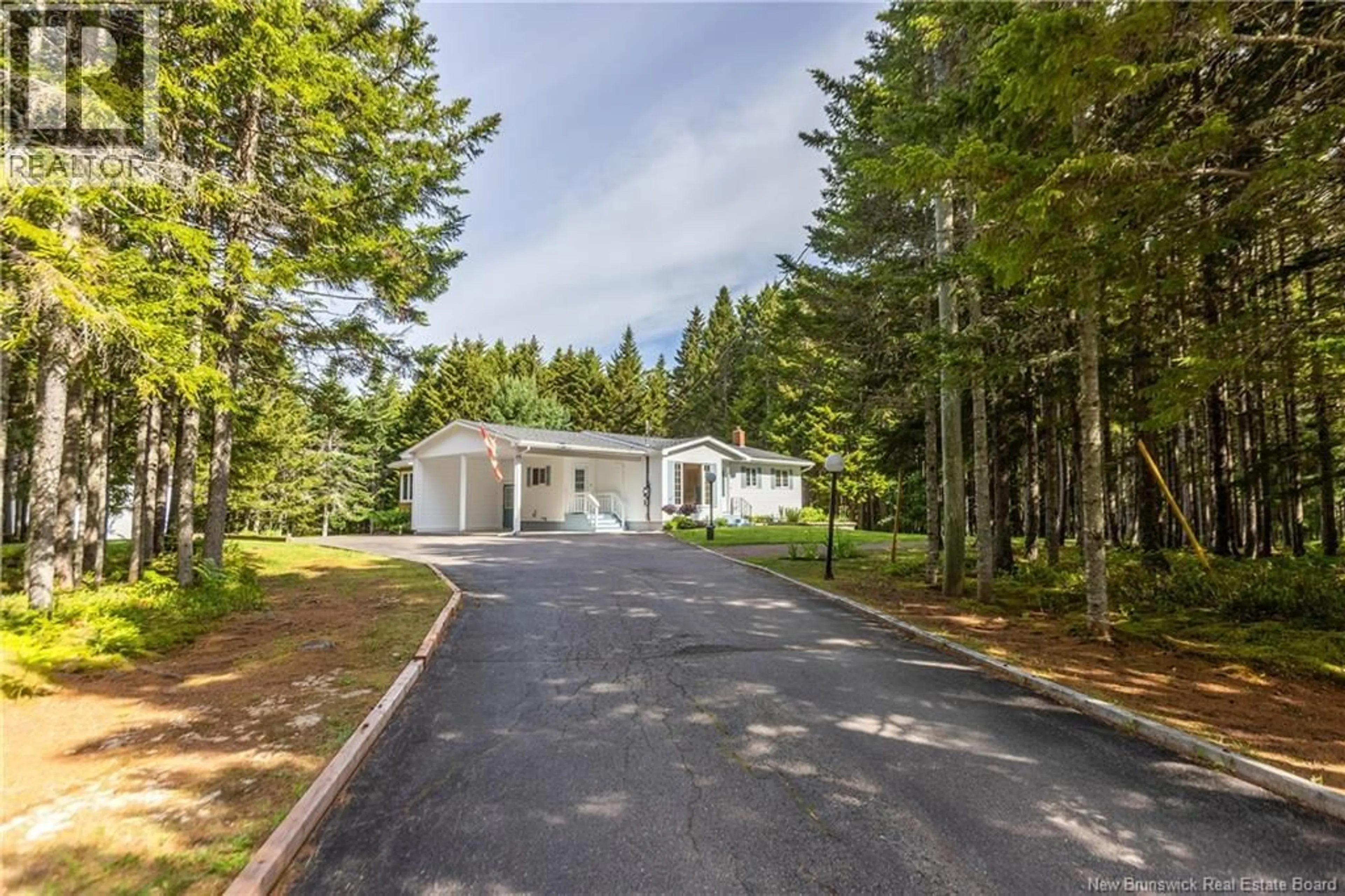 A pic from outside/outdoor area/front of a property/back of a property/a pic from drone, forest/trees view for 18 TRILLIUM DRIVE, Sackville New Brunswick E4L3K2