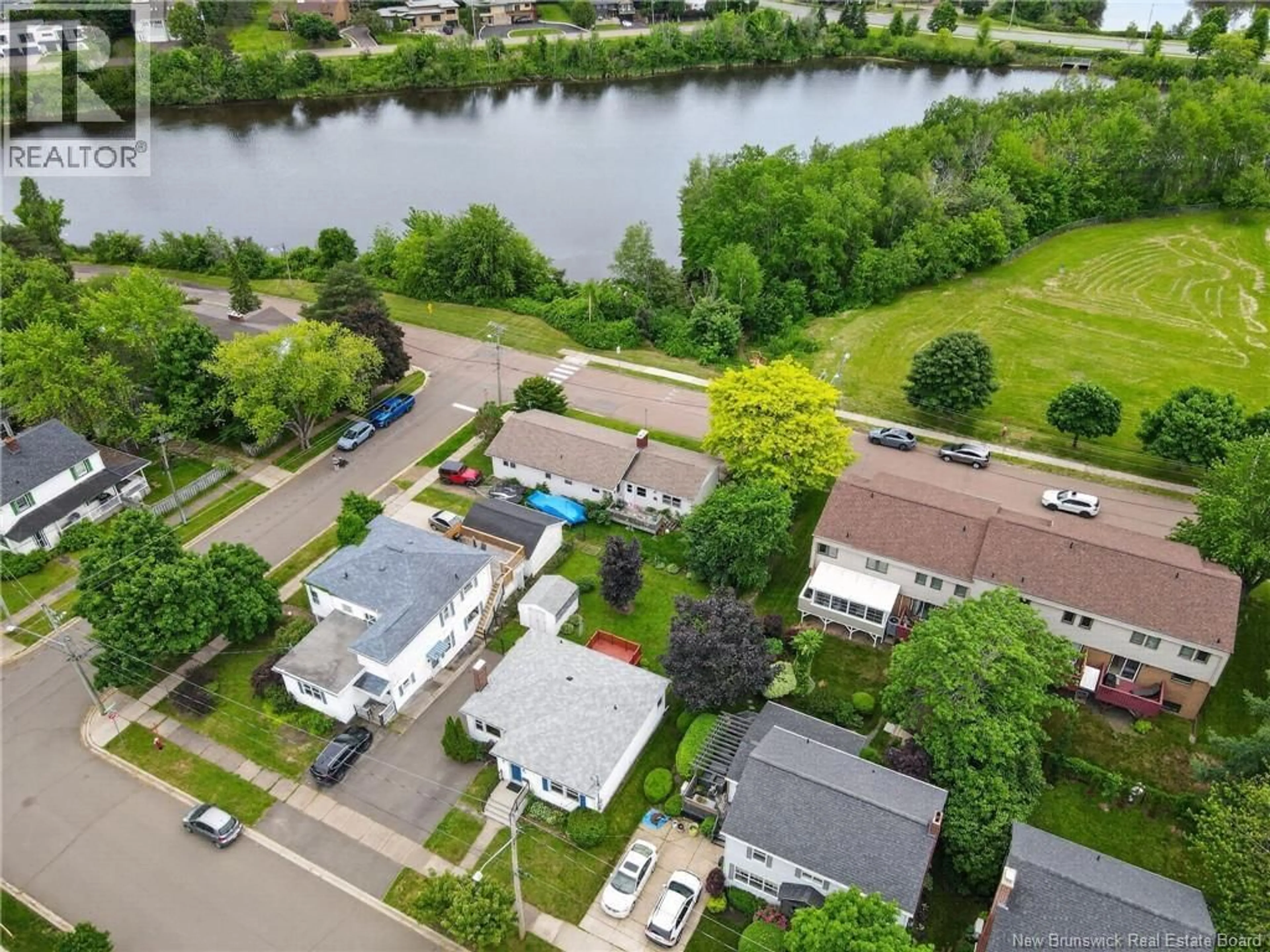 A pic from outside/outdoor area/front of a property/back of a property/a pic from drone, water/lake/river/ocean view for 68 GREENWOOD DRIVE, Moncton New Brunswick E1E3B7