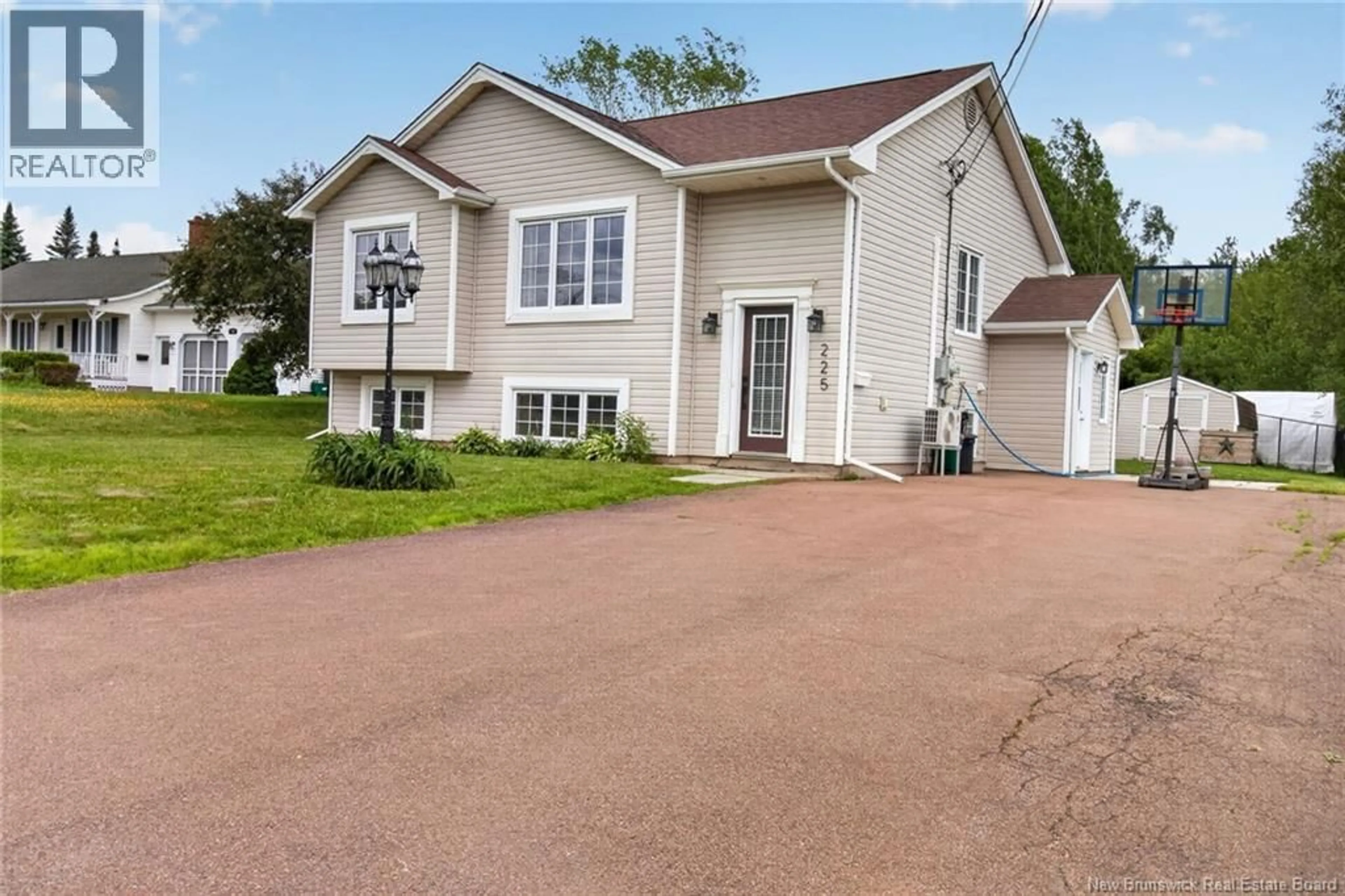 Home with vinyl exterior material, street for 225 THOMAS STREET, Dieppe New Brunswick E1A2C3