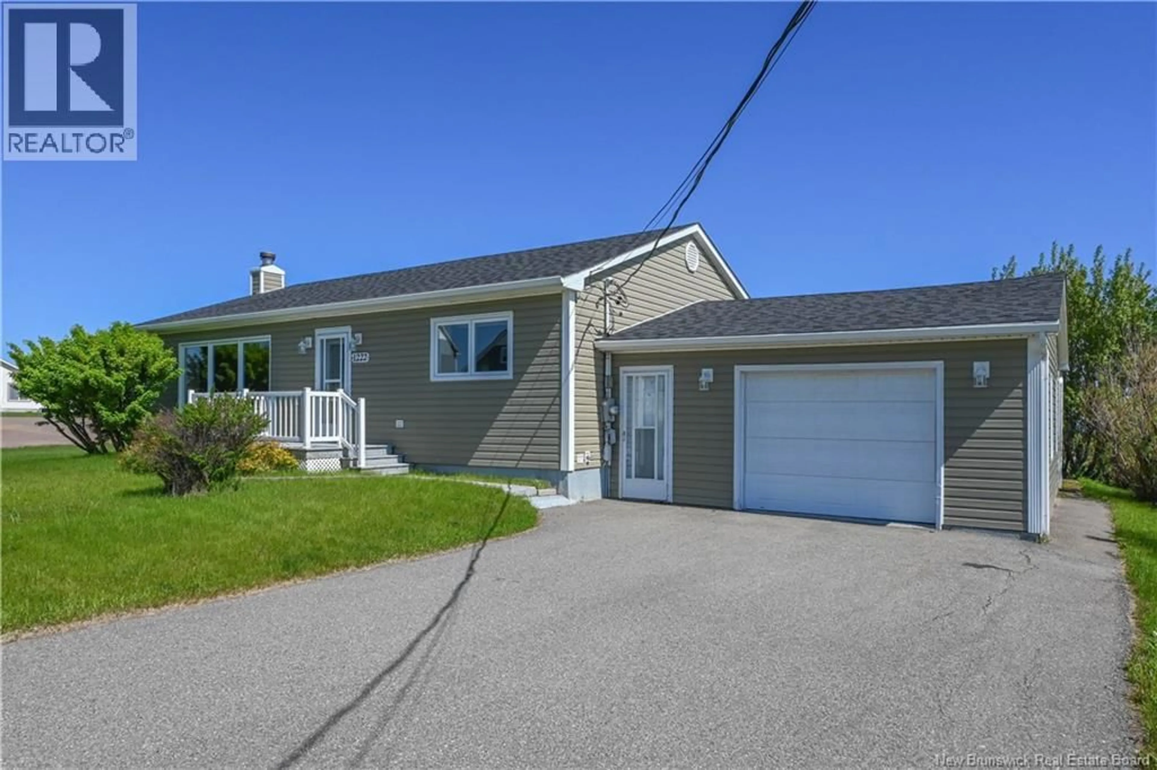 Home with vinyl exterior material, street for 1222 CHIASSON ROAD, Chiasson Office New Brunswick E8S3E5