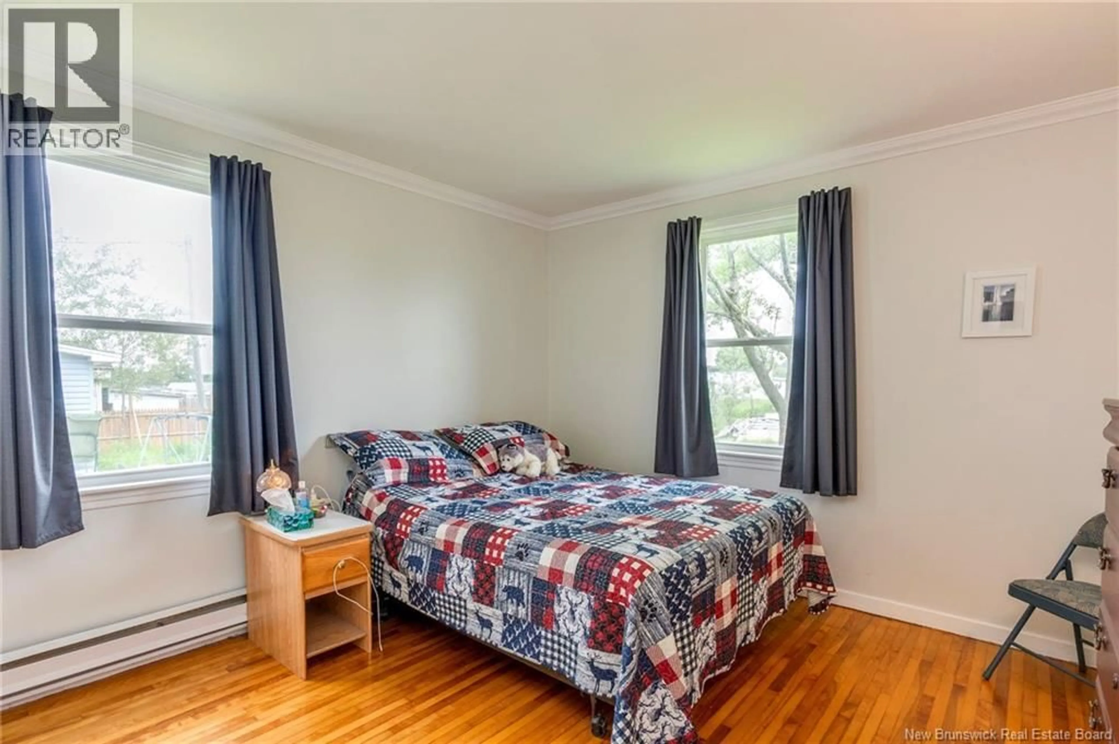 Bedroom with bed, wood/laminate floor for 97 GOLDEN GROVE ROAD, Saint John New Brunswick E2H1W6