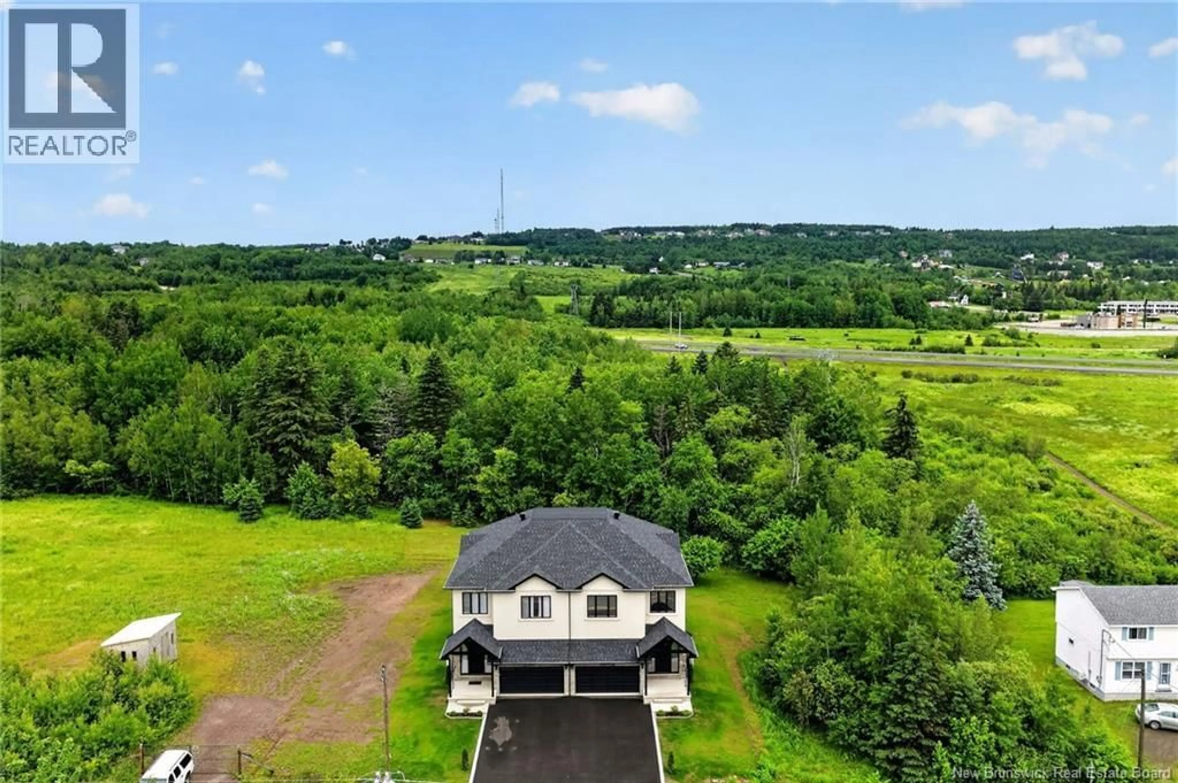 A pic from outside/outdoor area/front of a property/back of a property/a pic from drone, water/lake/river/ocean view for 133 CHARLES LUTES ROAD, Moncton New Brunswick E1G2P8