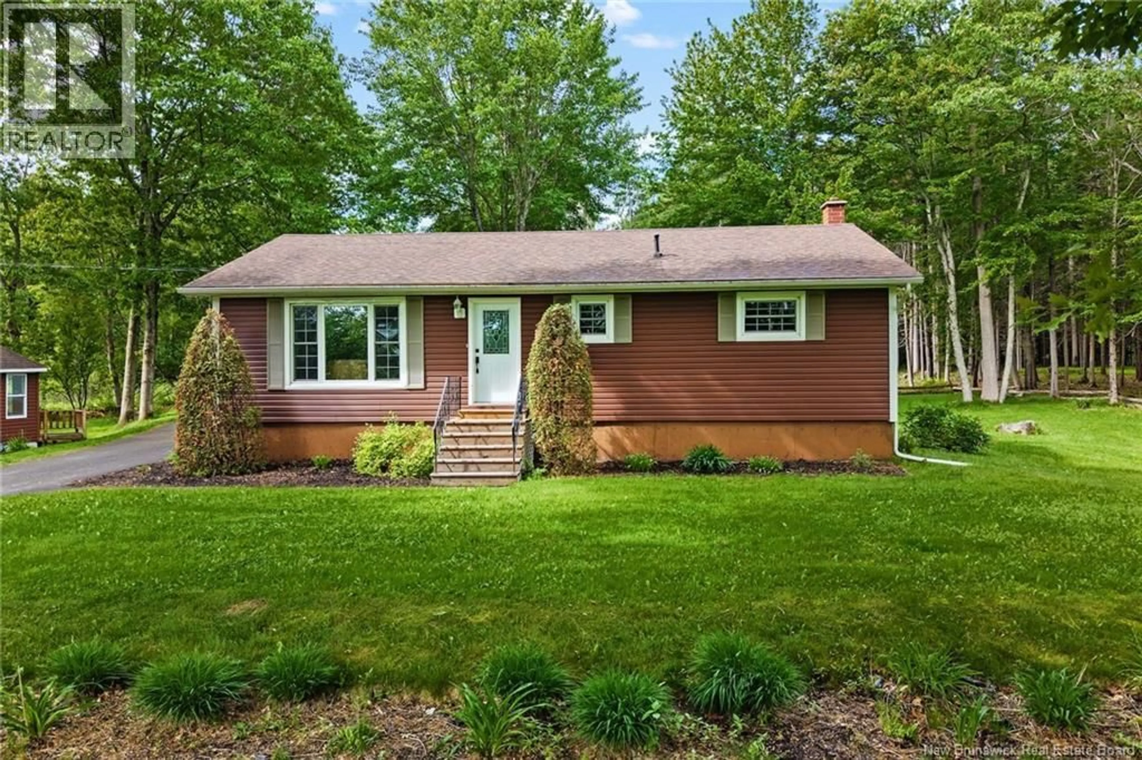 Home with vinyl exterior material, street for 14 JOHNSON ROAD, Newcastle Creek New Brunswick E4B2J3