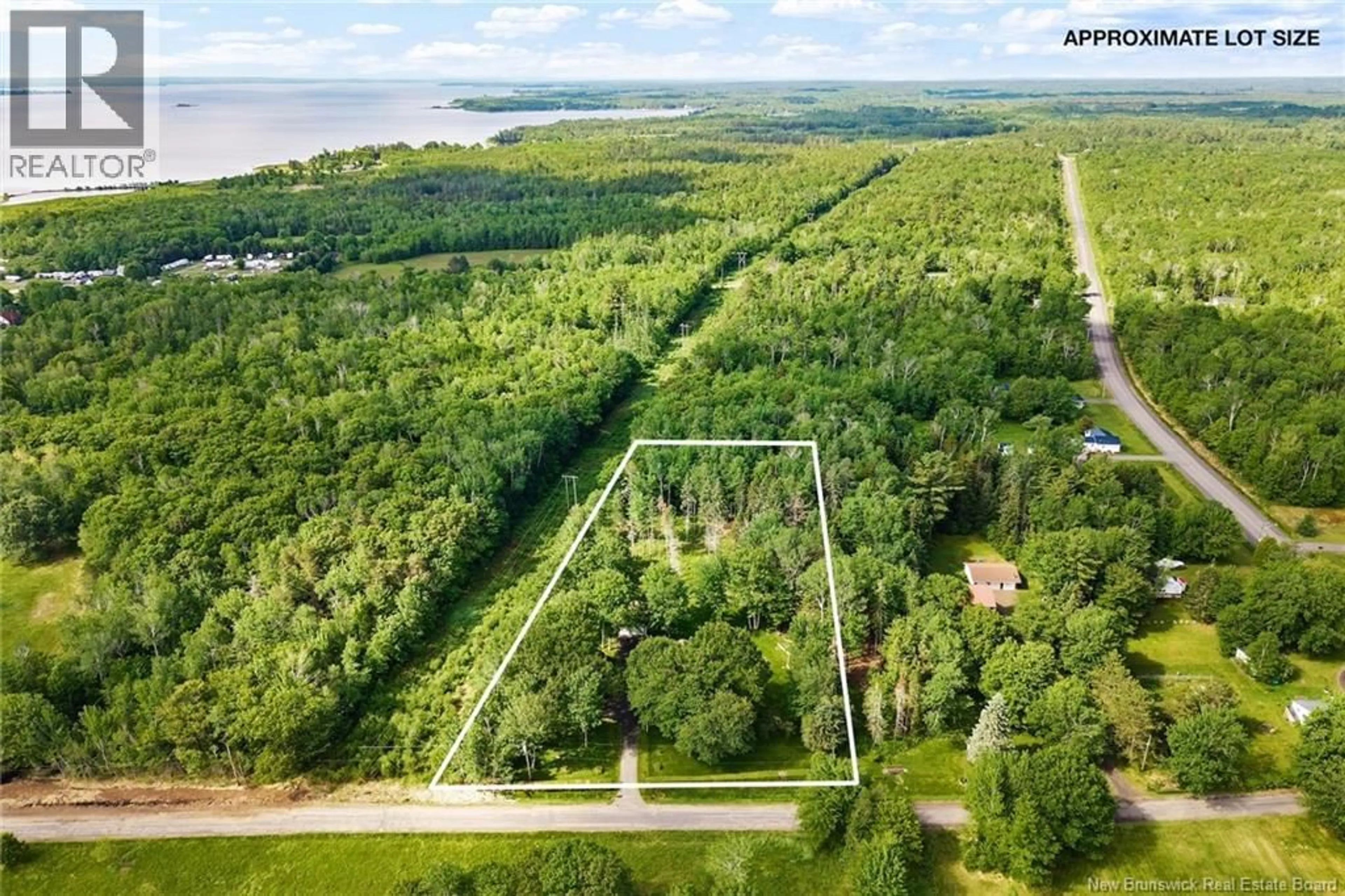 A pic from outside/outdoor area/front of a property/back of a property/a pic from drone, forest/trees view for 14 JOHNSON ROAD, Newcastle Creek New Brunswick E4B2J3