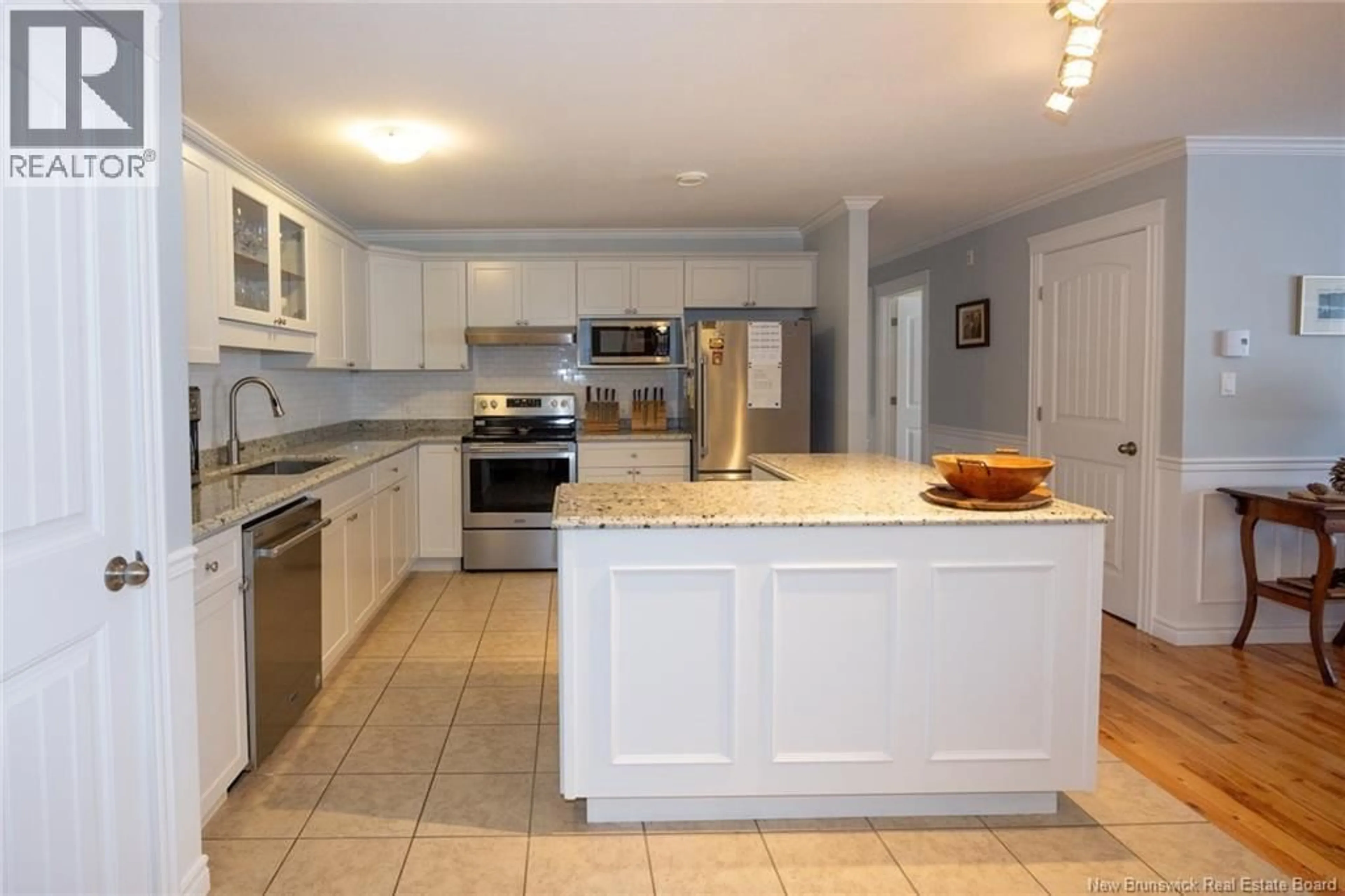 Open concept kitchen, ceramic/tile floor for 209 - 170 VALCOUR DRIVE, Fredericton New Brunswick E3C0C9