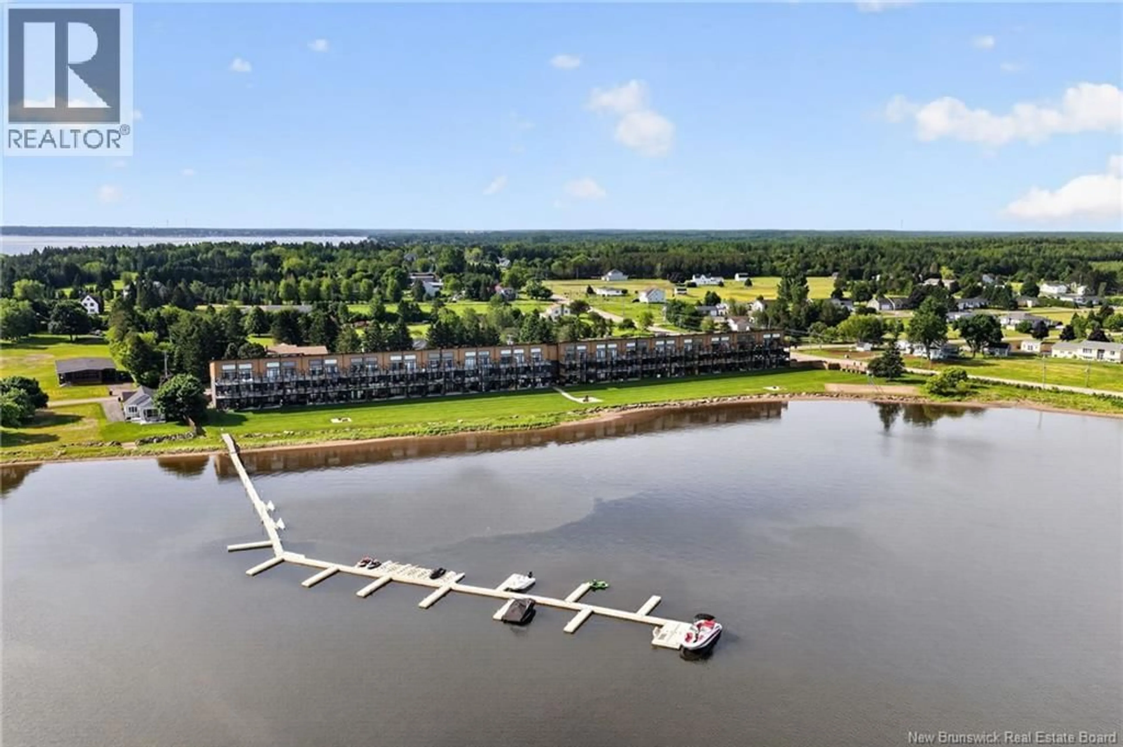 A pic from outside/outdoor area/front of a property/back of a property/a pic from drone, water/lake/river/ocean view for 104 - 3808 ROUTE 134, Shediac Bridge New Brunswick E4R1T5