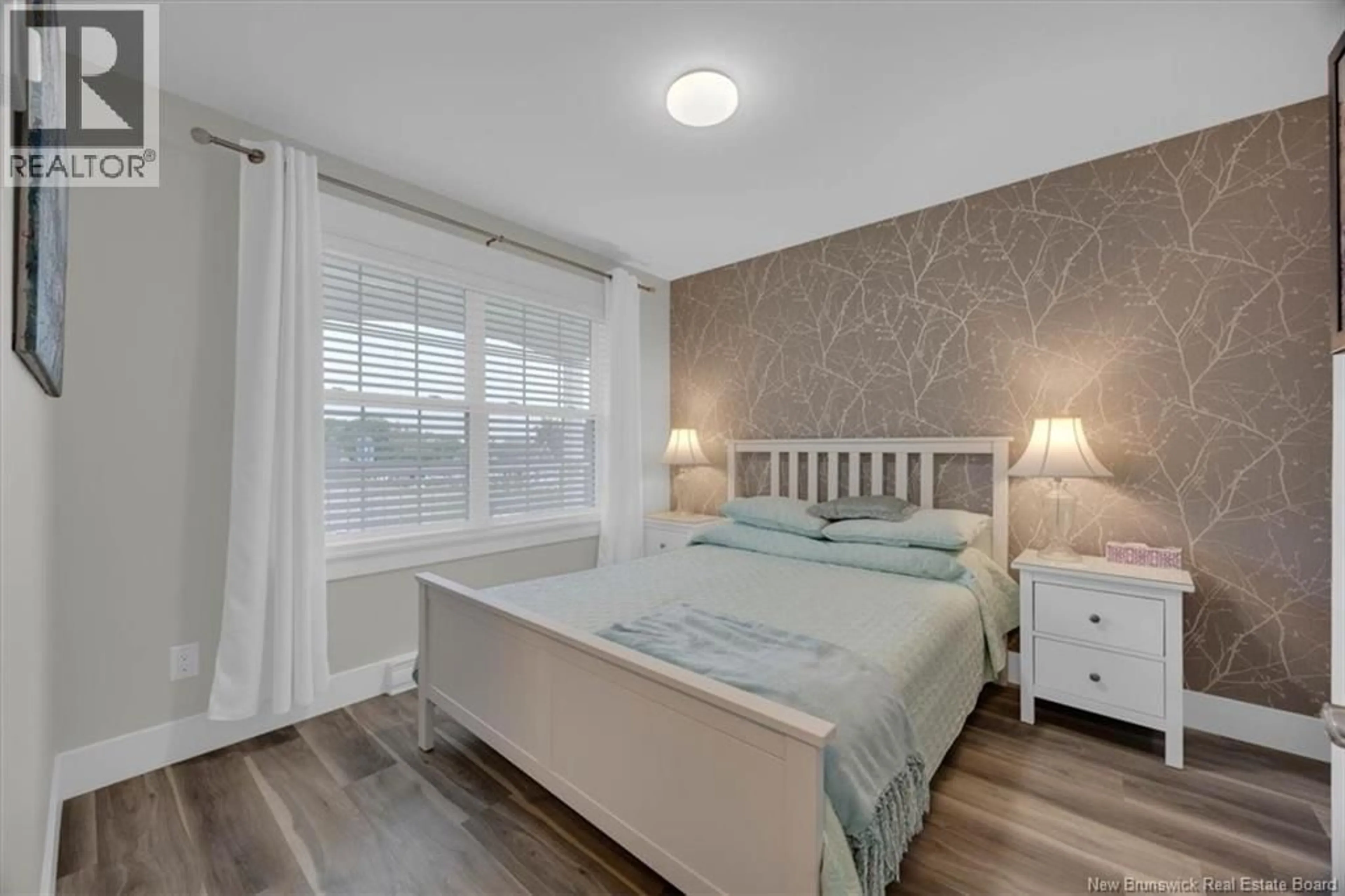 Bedroom with bed, wood/laminate floor for 94 MALONE WAY, Sussex New Brunswick E4E0C9