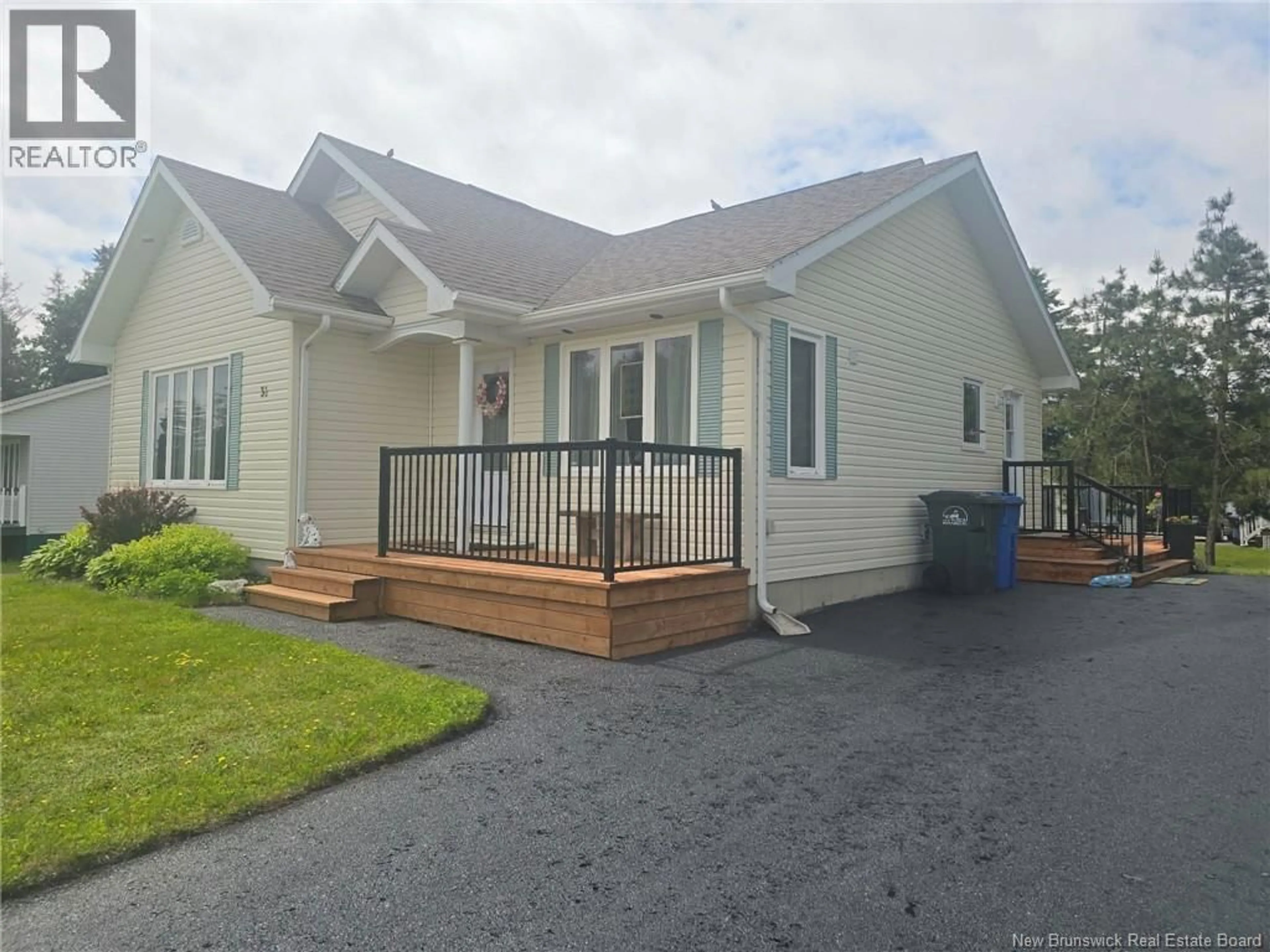 Home with vinyl exterior material, street for 31 NORMA STREET, Miramichi New Brunswick E1V6B7