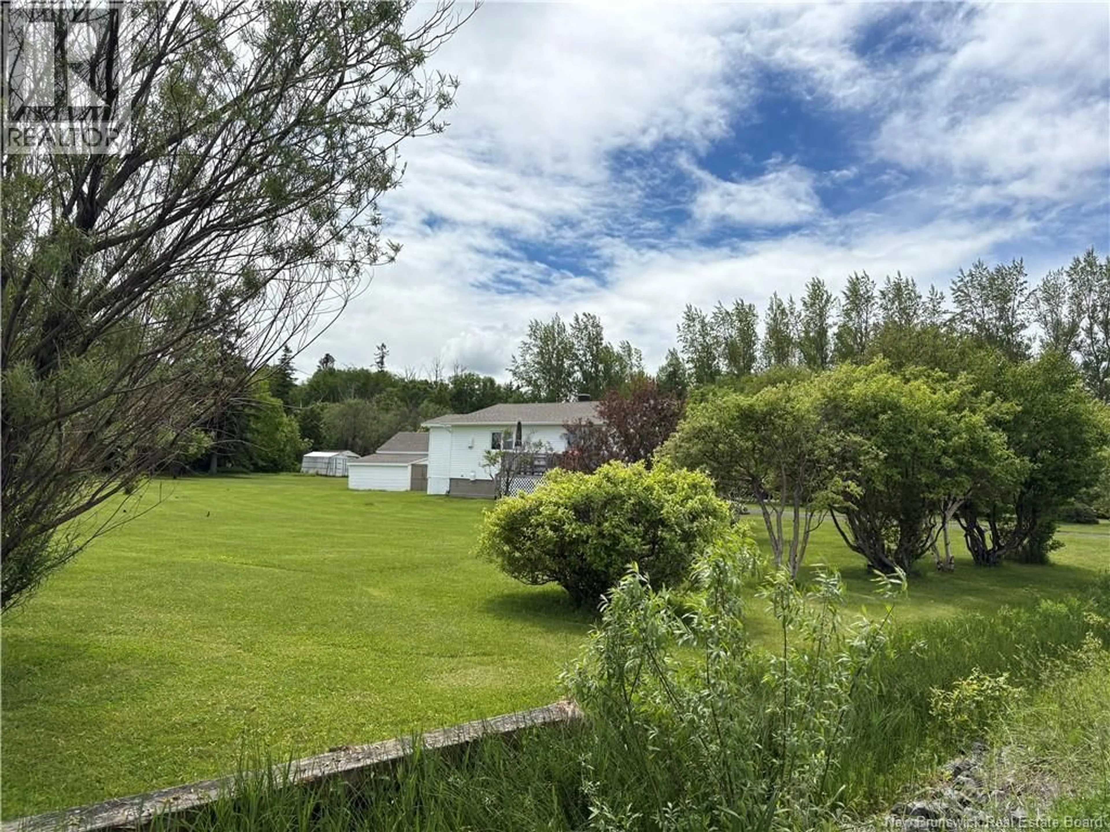 A pic from outside/outdoor area/front of a property/back of a property/a pic from drone, unknown for 75 RUE DES CHALETS, Pointe-Verte New Brunswick E8J2R4