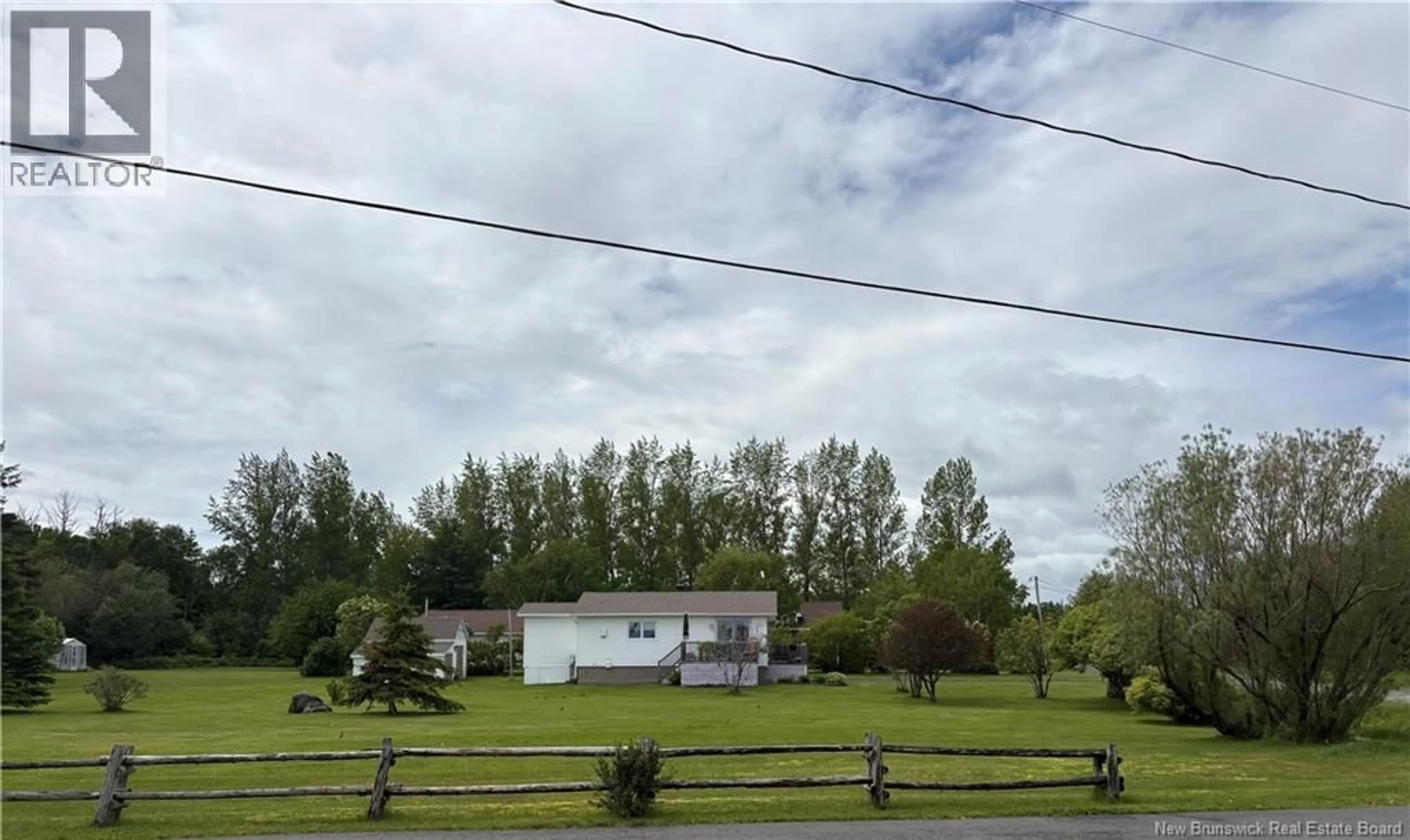 A pic from outside/outdoor area/front of a property/back of a property/a pic from drone, unknown for 75 RUE DES CHALETS, Pointe-Verte New Brunswick E8J2R4