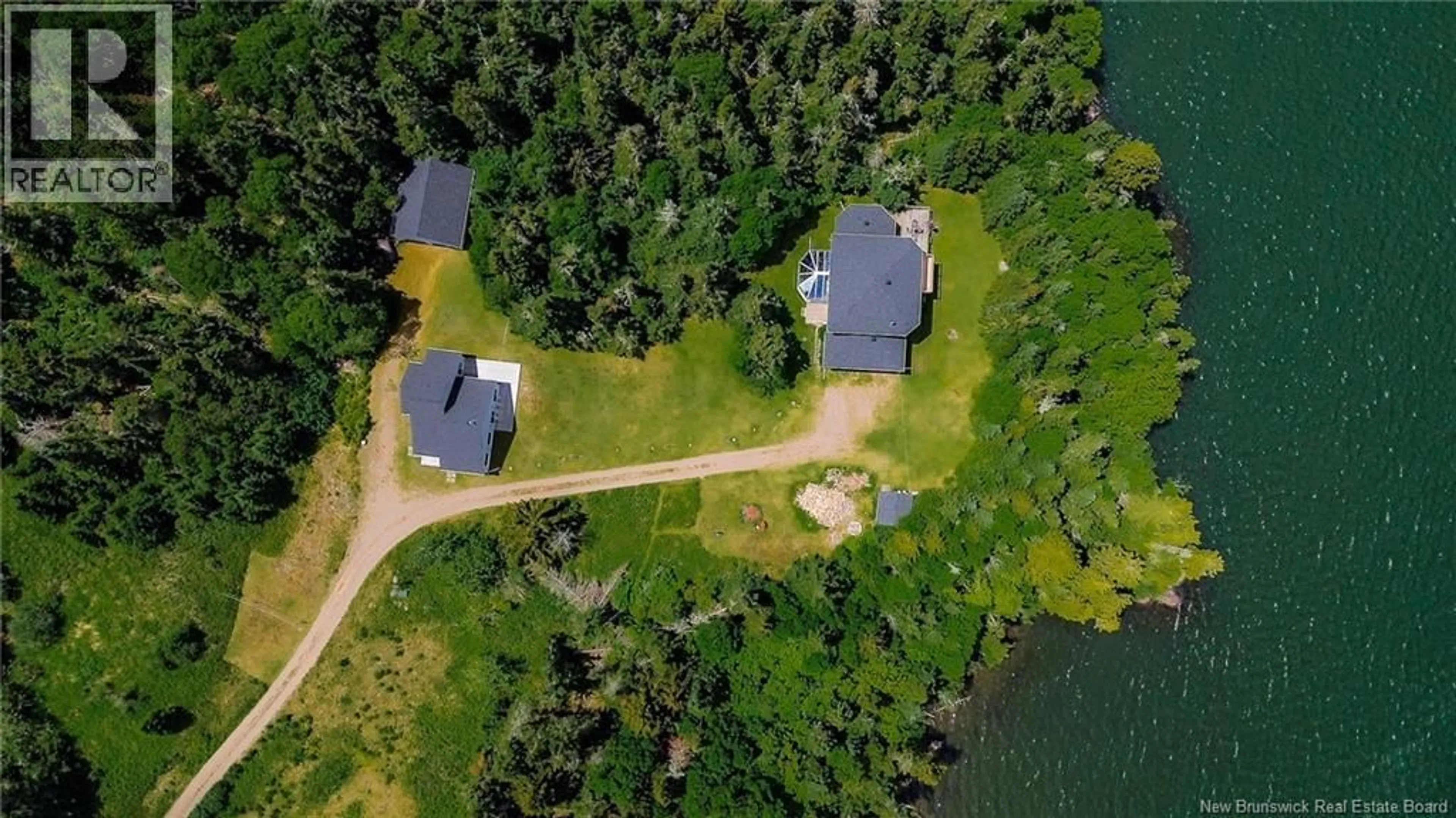 A pic from outside/outdoor area/front of a property/back of a property/a pic from drone, water/lake/river/ocean view for 140 BOYNE ROAD, Little Lepreau New Brunswick E5J1R2