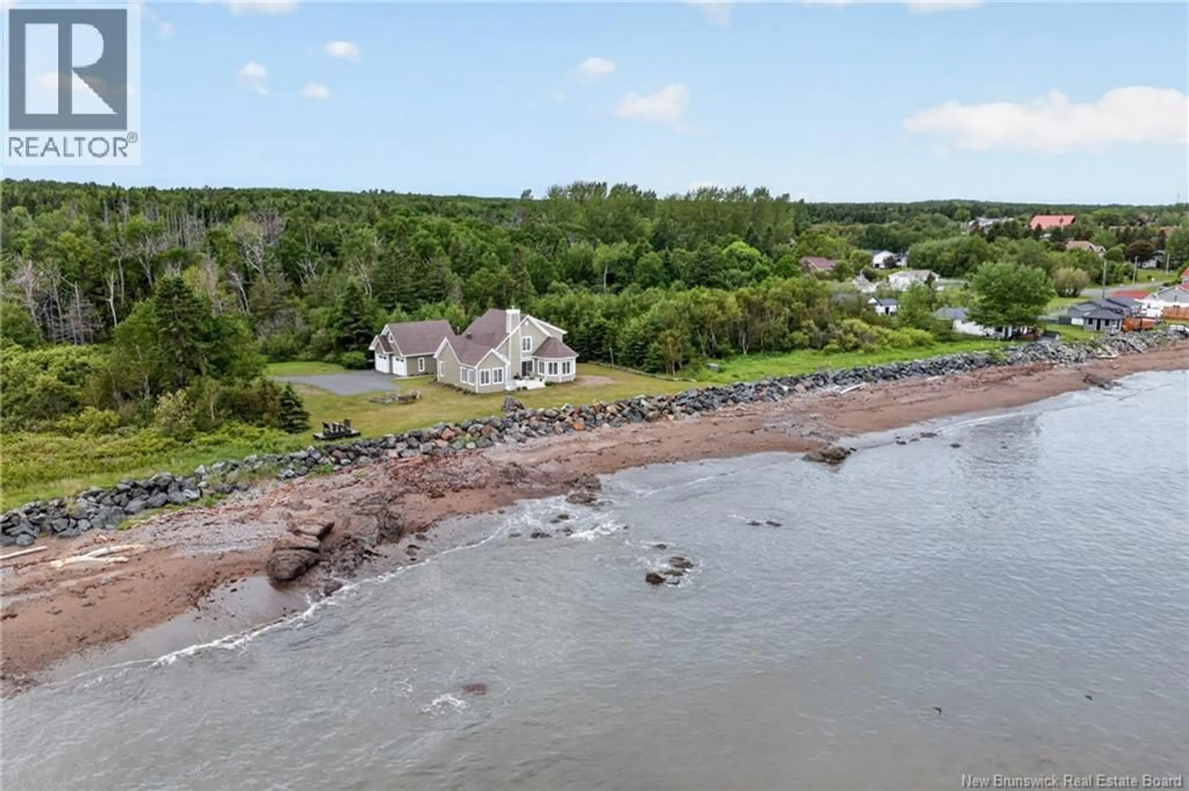 A pic from outside/outdoor area/front of a property/back of a property/a pic from drone, water/lake/river/ocean view for 1 RUE DES CAPS, Pointe-Verte New Brunswick E8J3A9