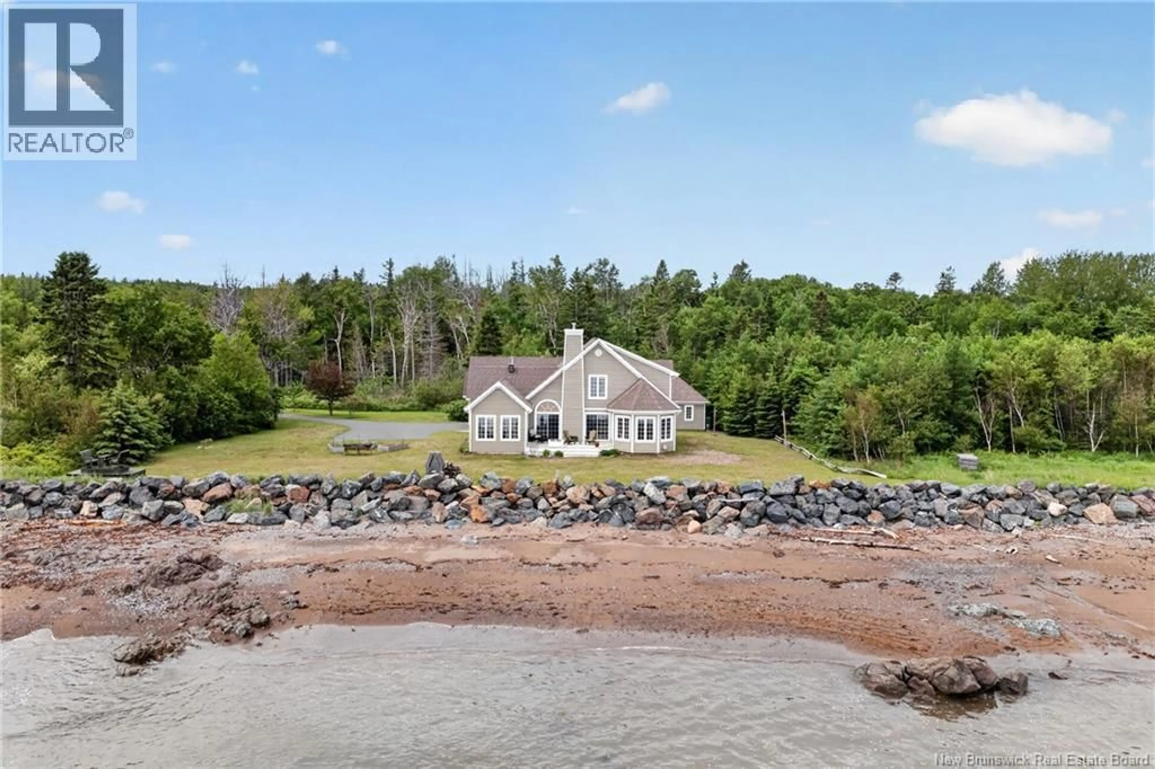 A pic from outside/outdoor area/front of a property/back of a property/a pic from drone, water/lake/river/ocean view for 1 RUE DES CAPS, Pointe-Verte New Brunswick E8J3A9