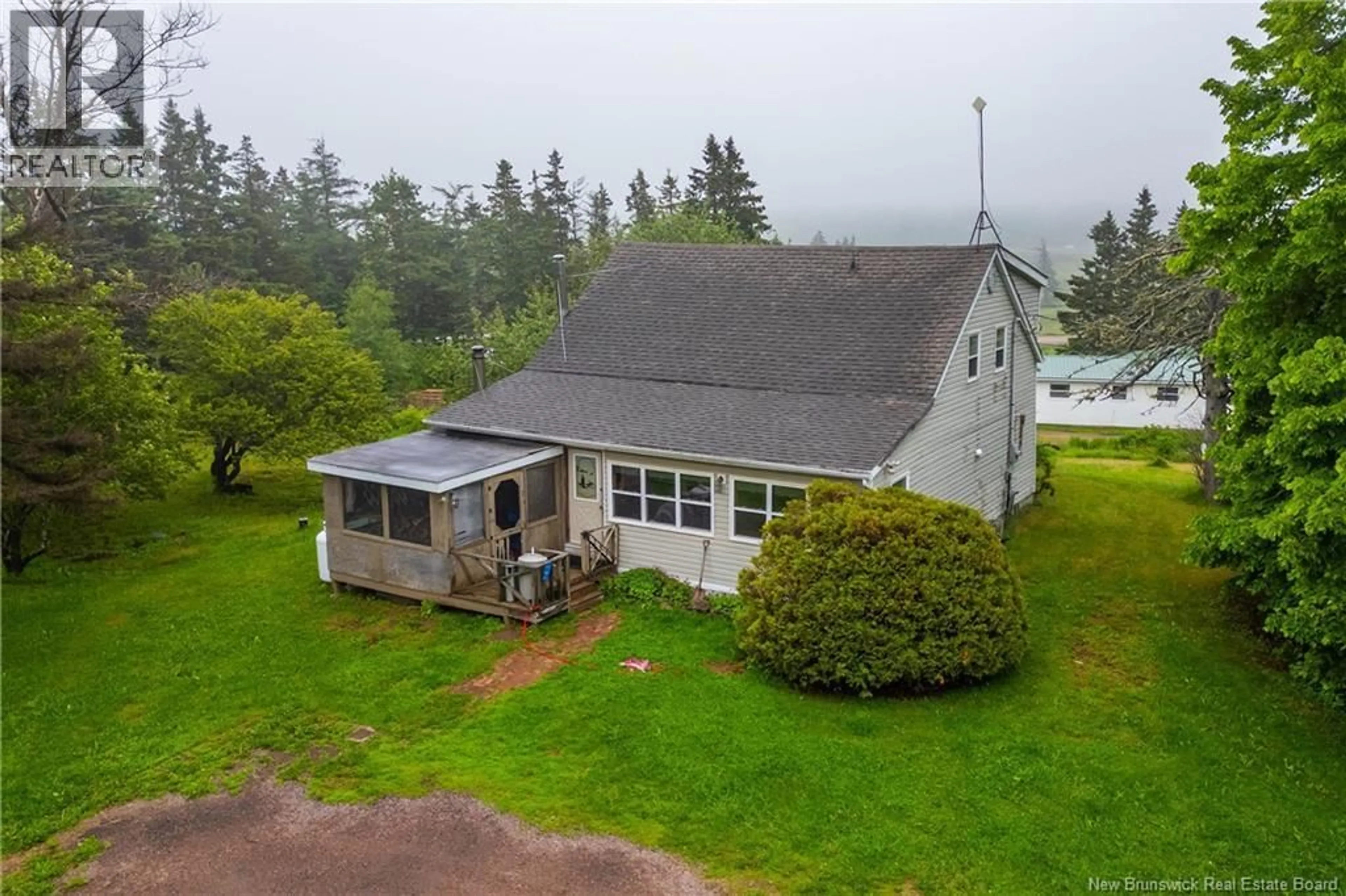A pic from outside/outdoor area/front of a property/back of a property/a pic from drone, unknown for 141 AULAC ROAD, Aulac New Brunswick E4L2V9