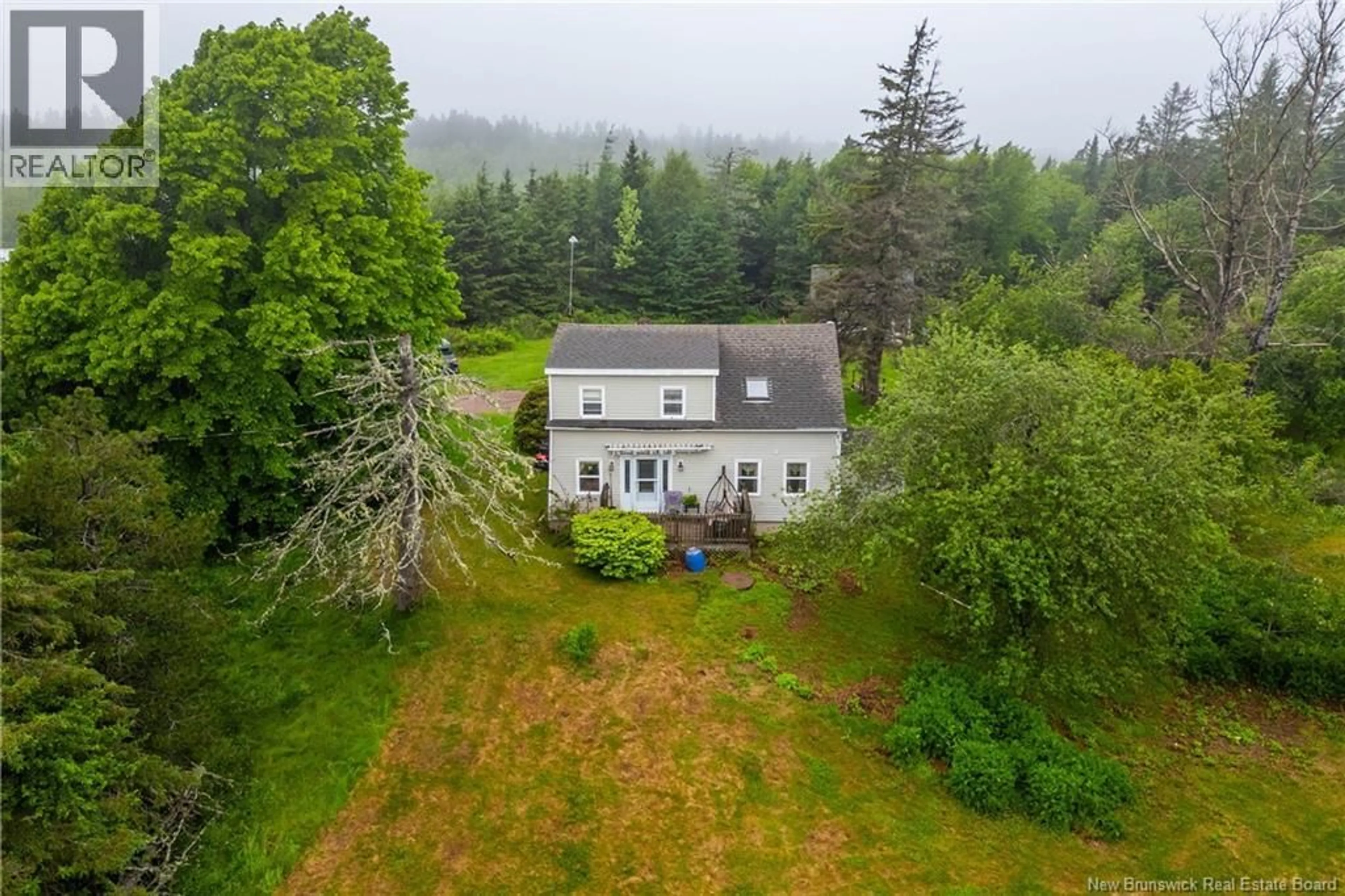 A pic from outside/outdoor area/front of a property/back of a property/a pic from drone, unknown for 141 AULAC ROAD, Aulac New Brunswick E4L2V9
