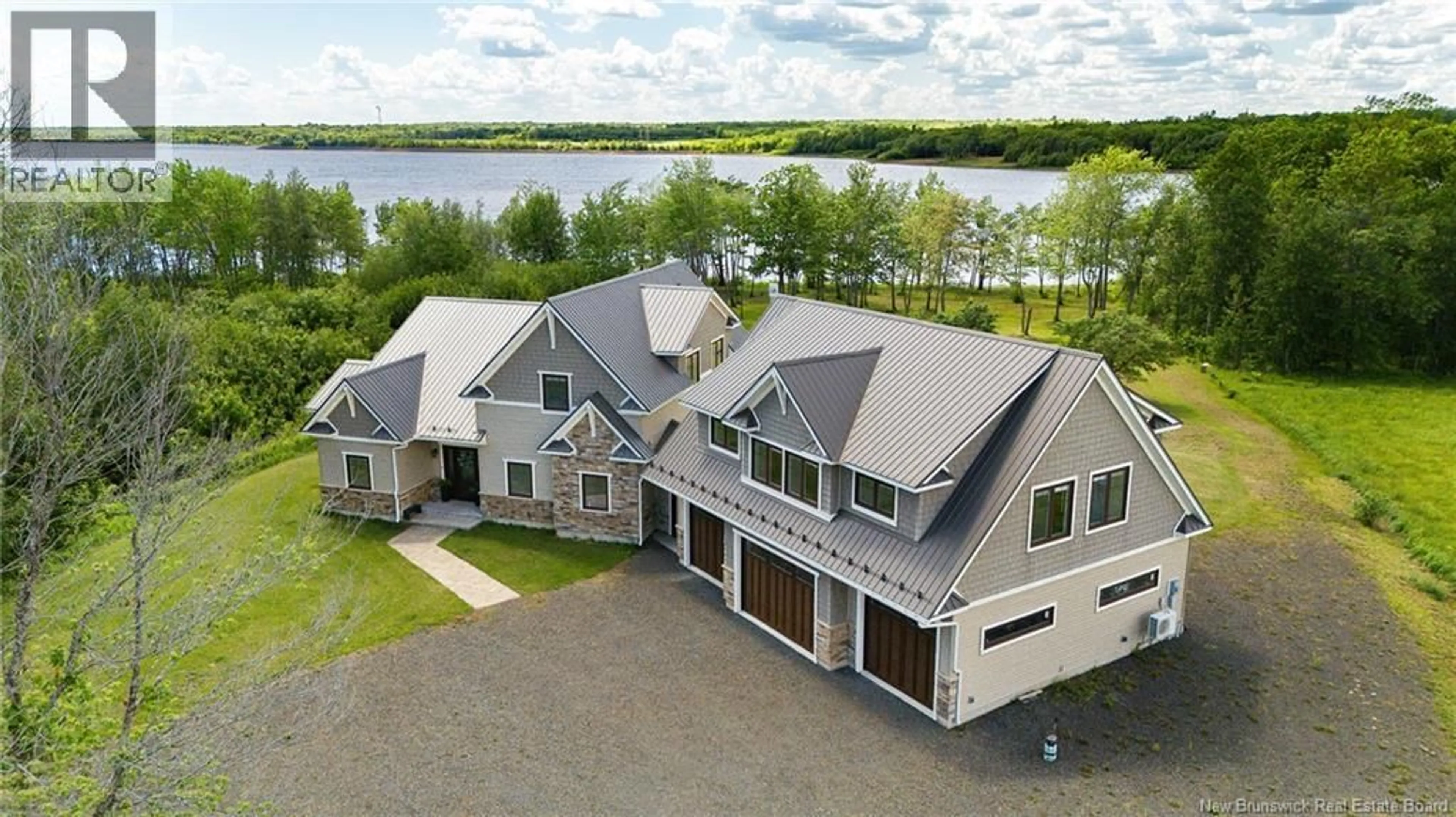 A pic from outside/outdoor area/front of a property/back of a property/a pic from drone, water/lake/river/ocean view for 192 CHAPMAN ROAD, Newcastle Creek New Brunswick E4B2M1