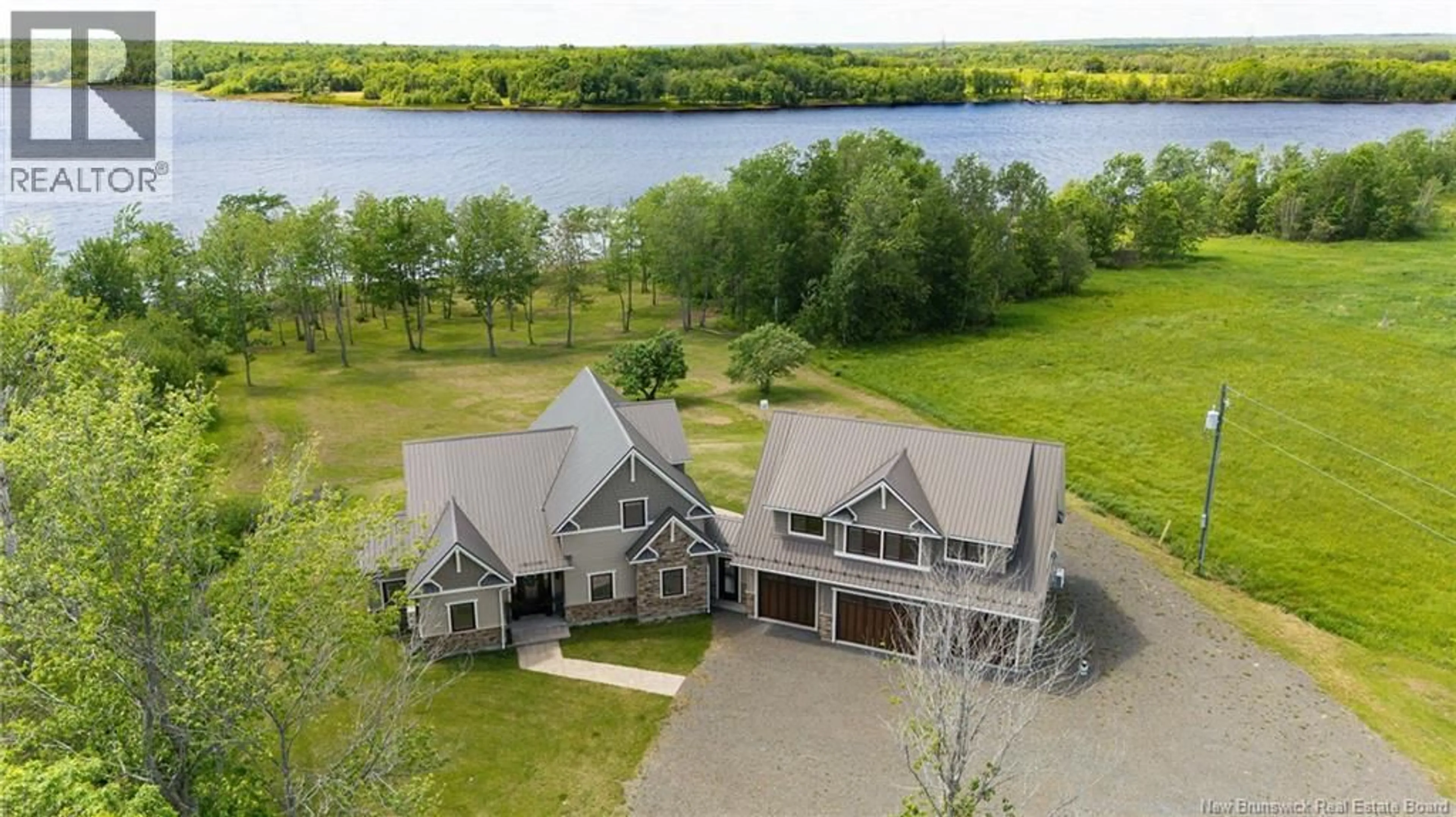 A pic from outside/outdoor area/front of a property/back of a property/a pic from drone, water/lake/river/ocean view for 192 CHAPMAN ROAD, Newcastle Creek New Brunswick E4B2M1