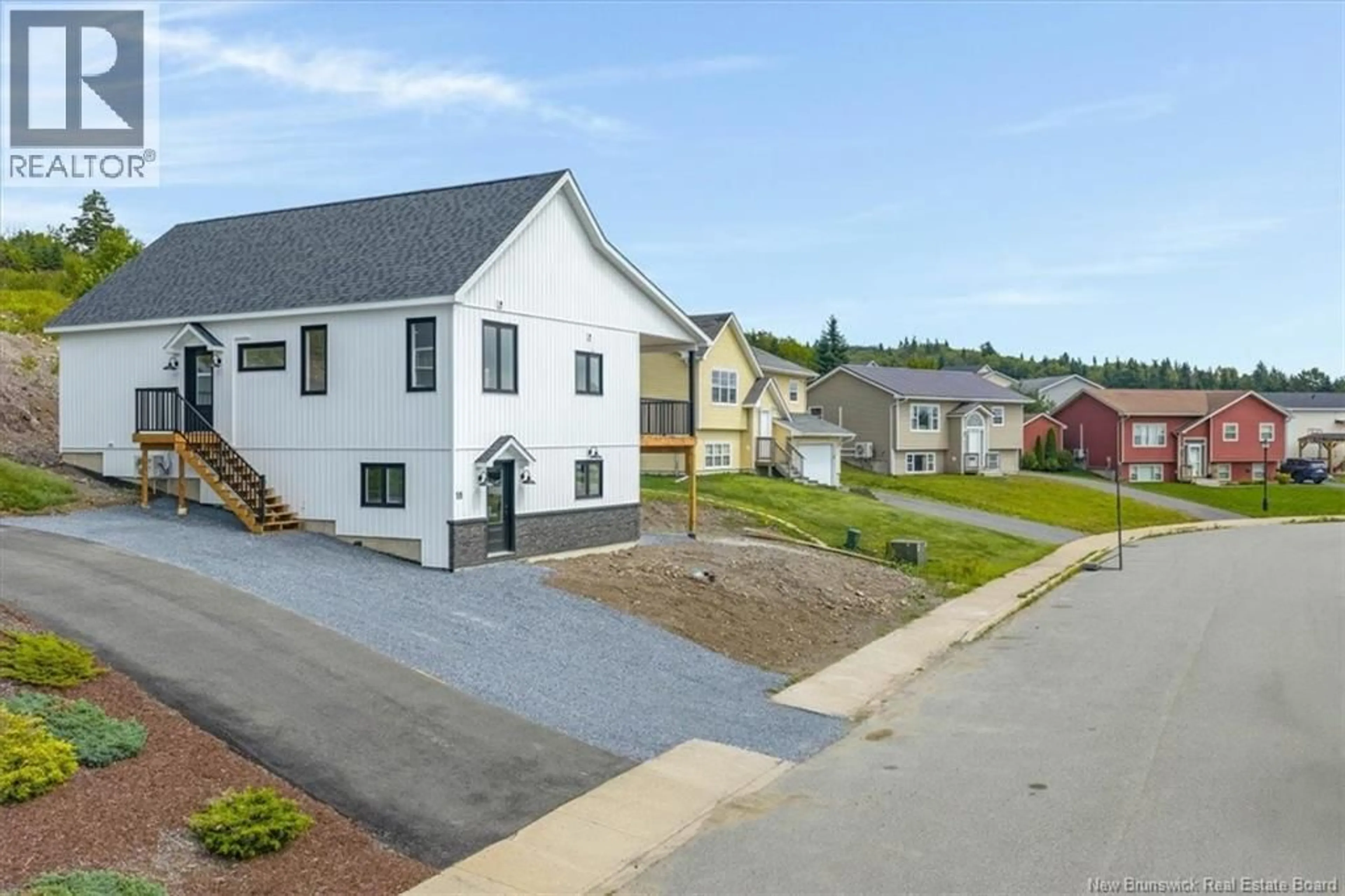 A pic from outside/outdoor area/front of a property/back of a property/a pic from drone, street for 18 REBA ROAD, Saint John New Brunswick E2J5E2