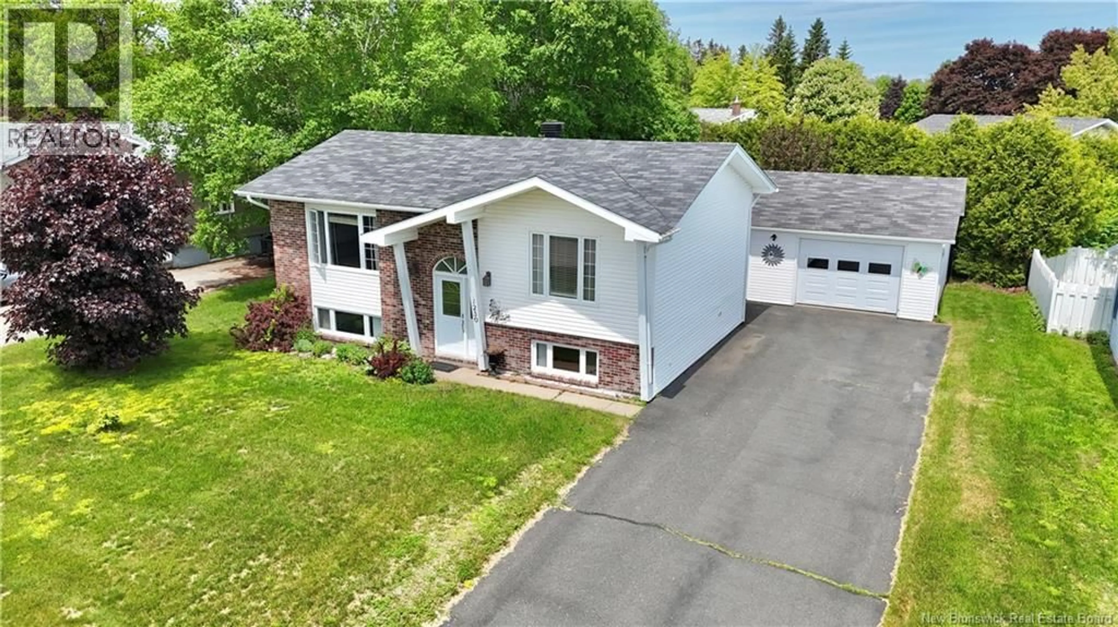 A pic from outside/outdoor area/front of a property/back of a property/a pic from drone, street for 1230 OCEAN RIDGE, Bathurst New Brunswick E2A4R7