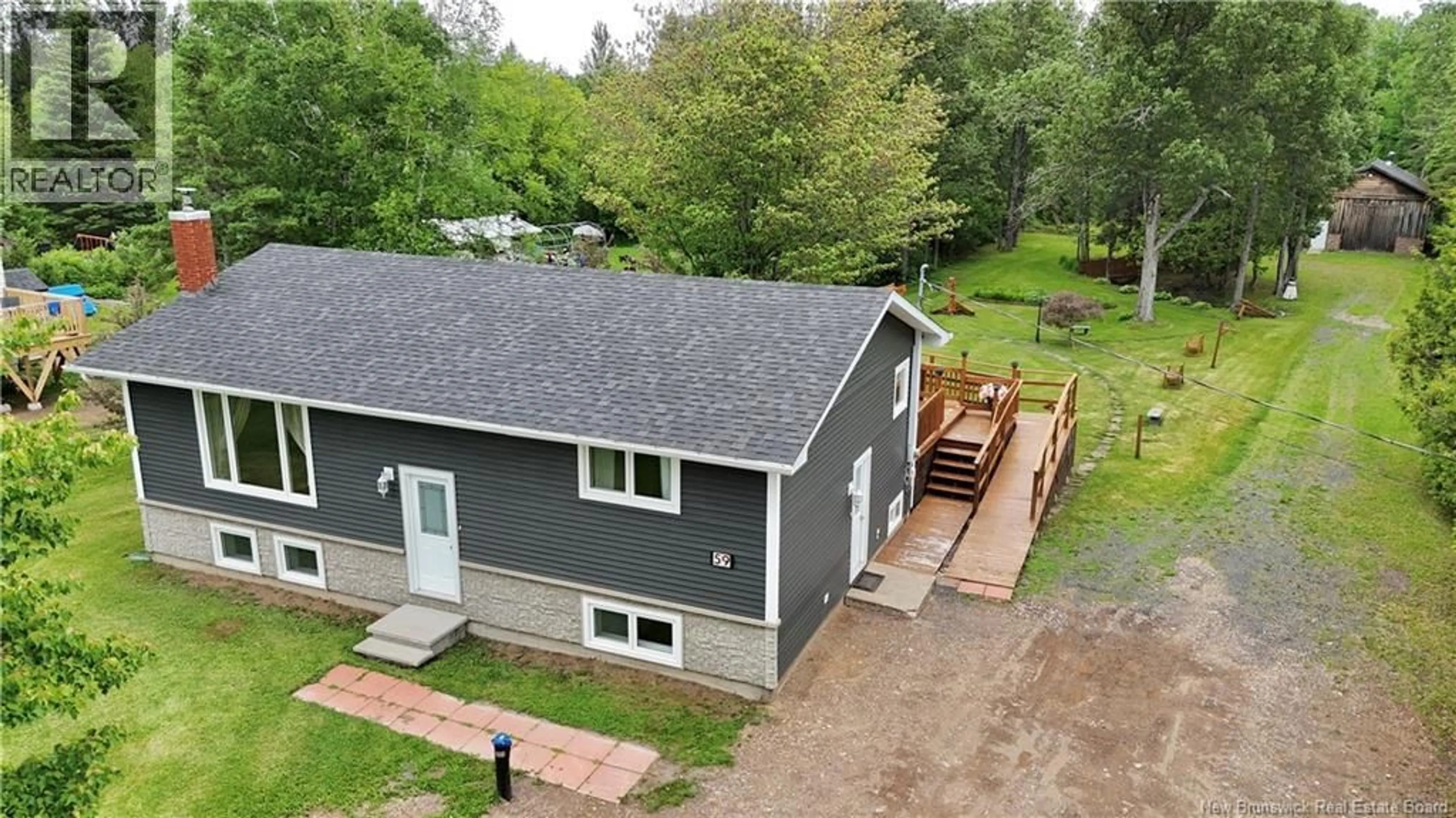 A pic from outside/outdoor area/front of a property/back of a property/a pic from drone, building for 59 SAINT ANDRE, Sainte-Anne New Brunswick E2A7Z1