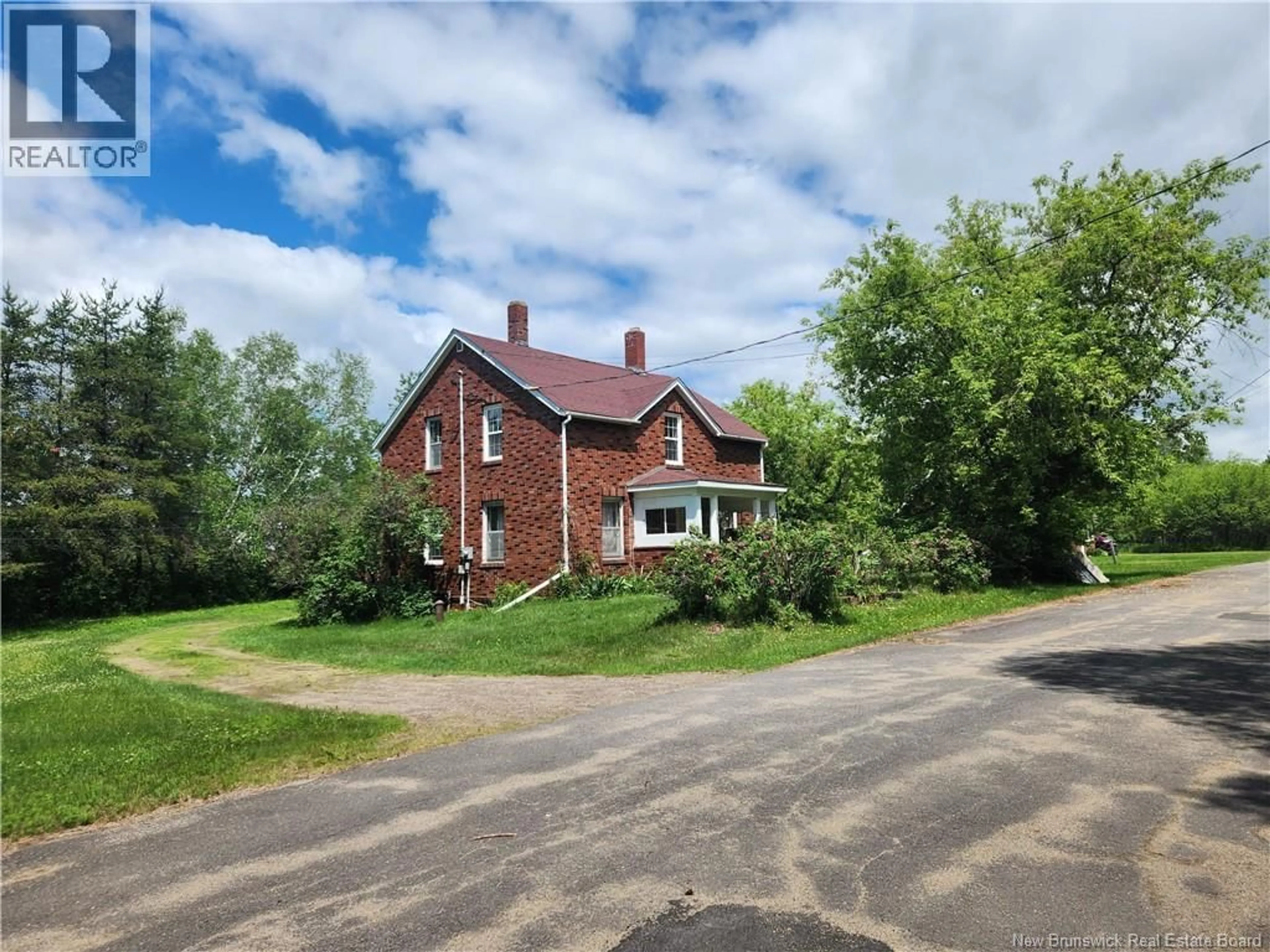 A pic from outside/outdoor area/front of a property/back of a property/a pic from drone, street for 54 SHAW STREET, Chipman New Brunswick E4A2H5