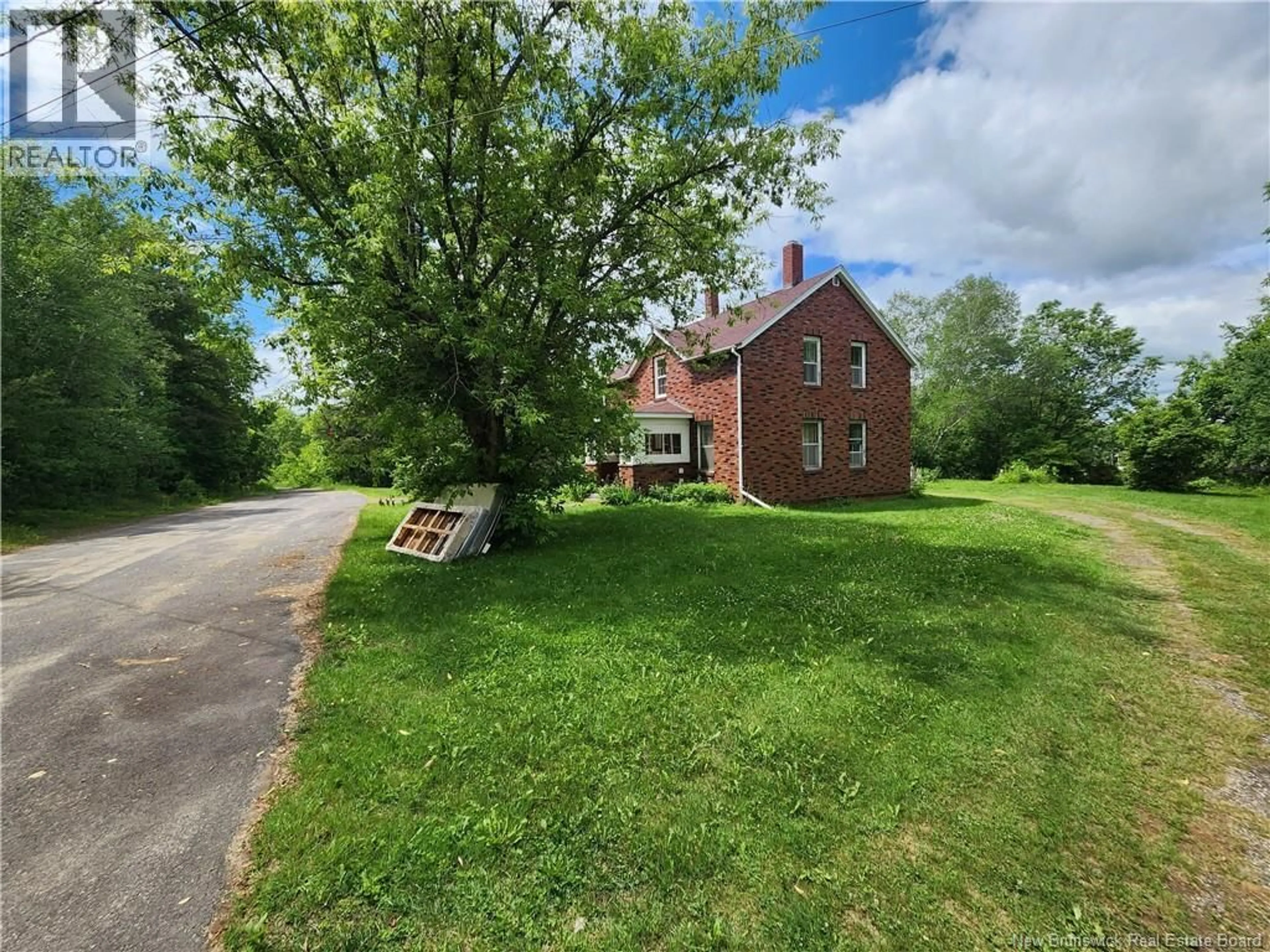 A pic from outside/outdoor area/front of a property/back of a property/a pic from drone, street for 54 SHAW STREET, Chipman New Brunswick E4A2H5