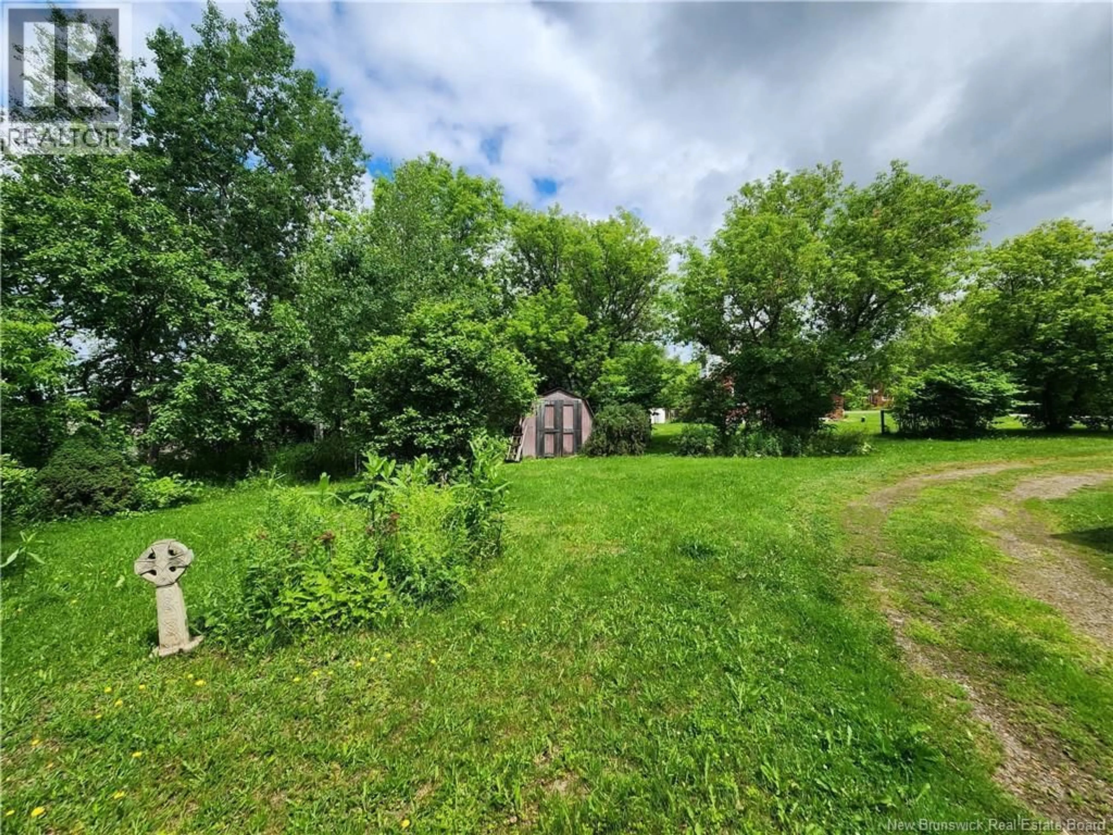 A pic from outside/outdoor area/front of a property/back of a property/a pic from drone, forest/trees view for 54 SHAW STREET, Chipman New Brunswick E4A2H5
