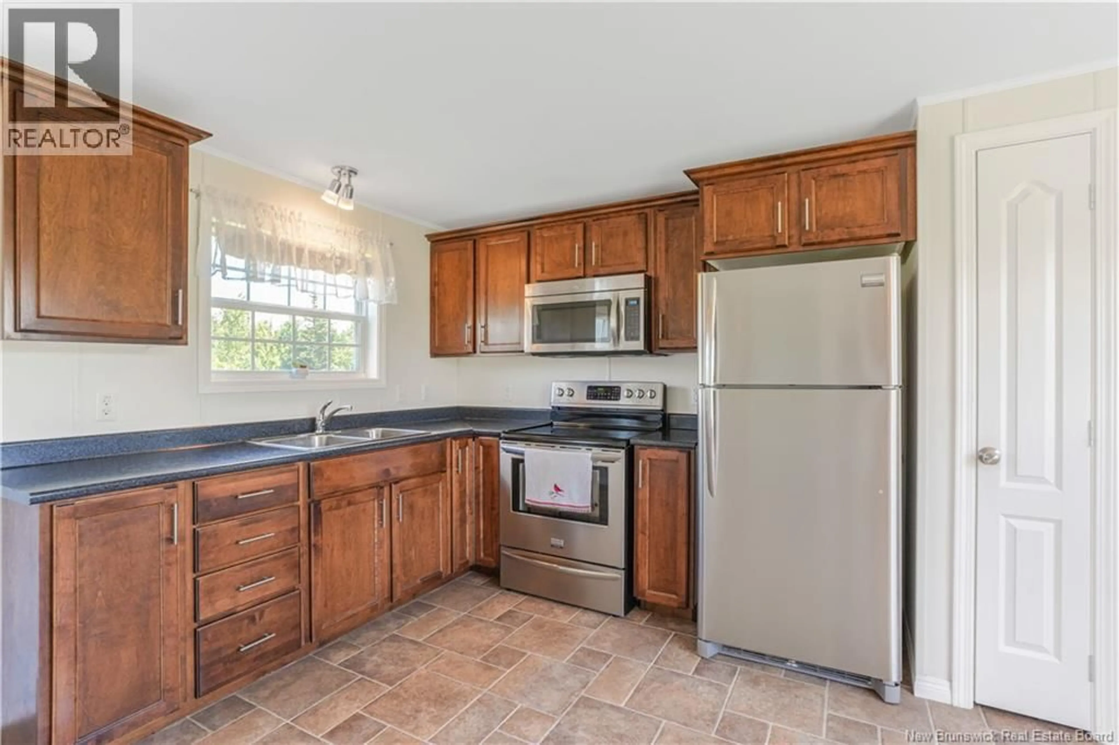 Standard kitchen, ceramic/tile floor for 26 CARRIE STREET, Rusagonis New Brunswick E3B0T2