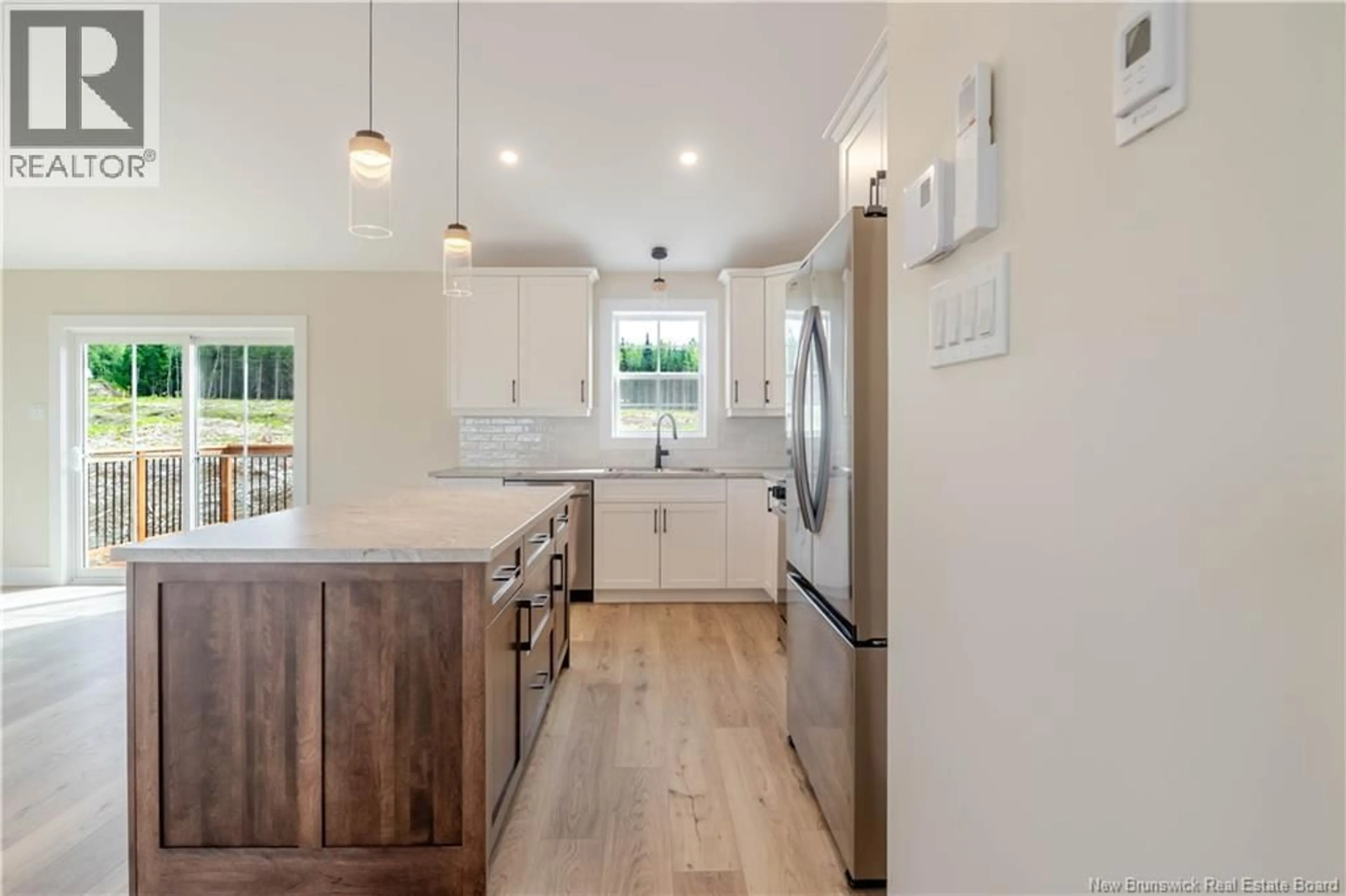 Open concept kitchen, wood/laminate floor for 116 AIDEN STREET, Fredericton New Brunswick E3G4C8