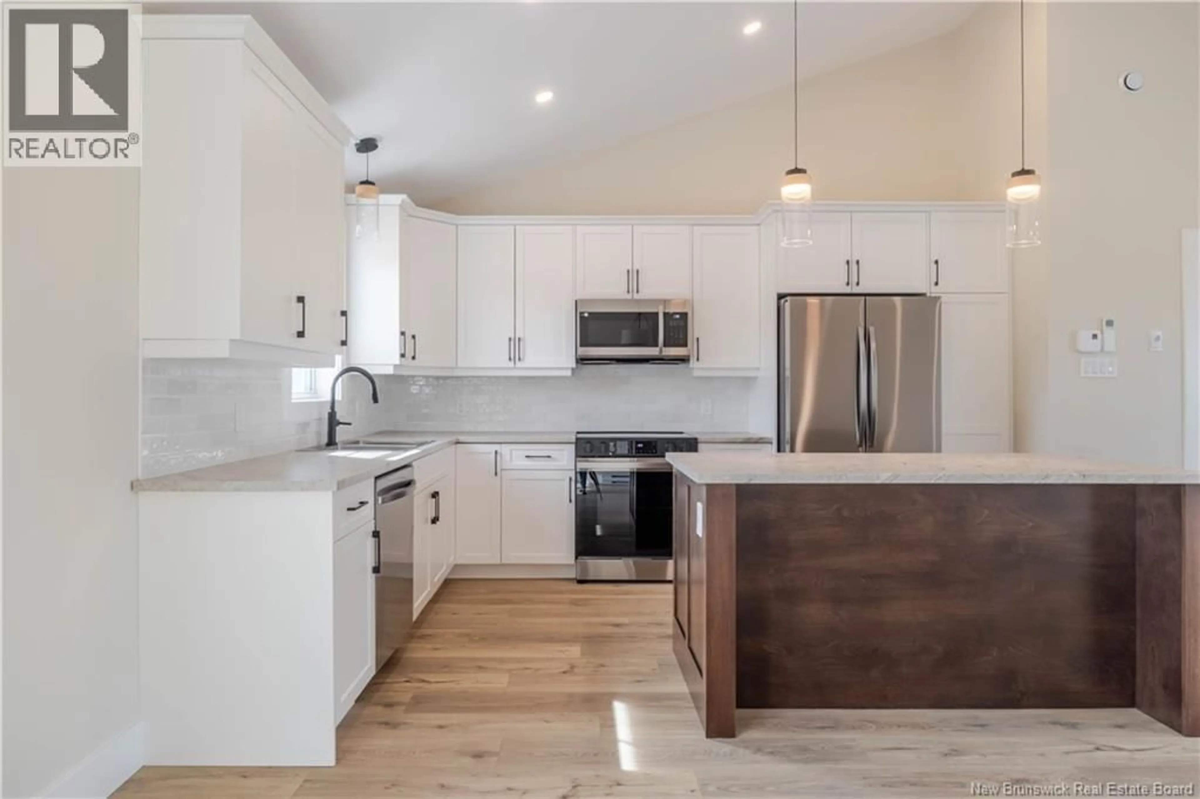 Open concept kitchen, wood/laminate floor for 116 AIDEN STREET, Fredericton New Brunswick E3G4C8