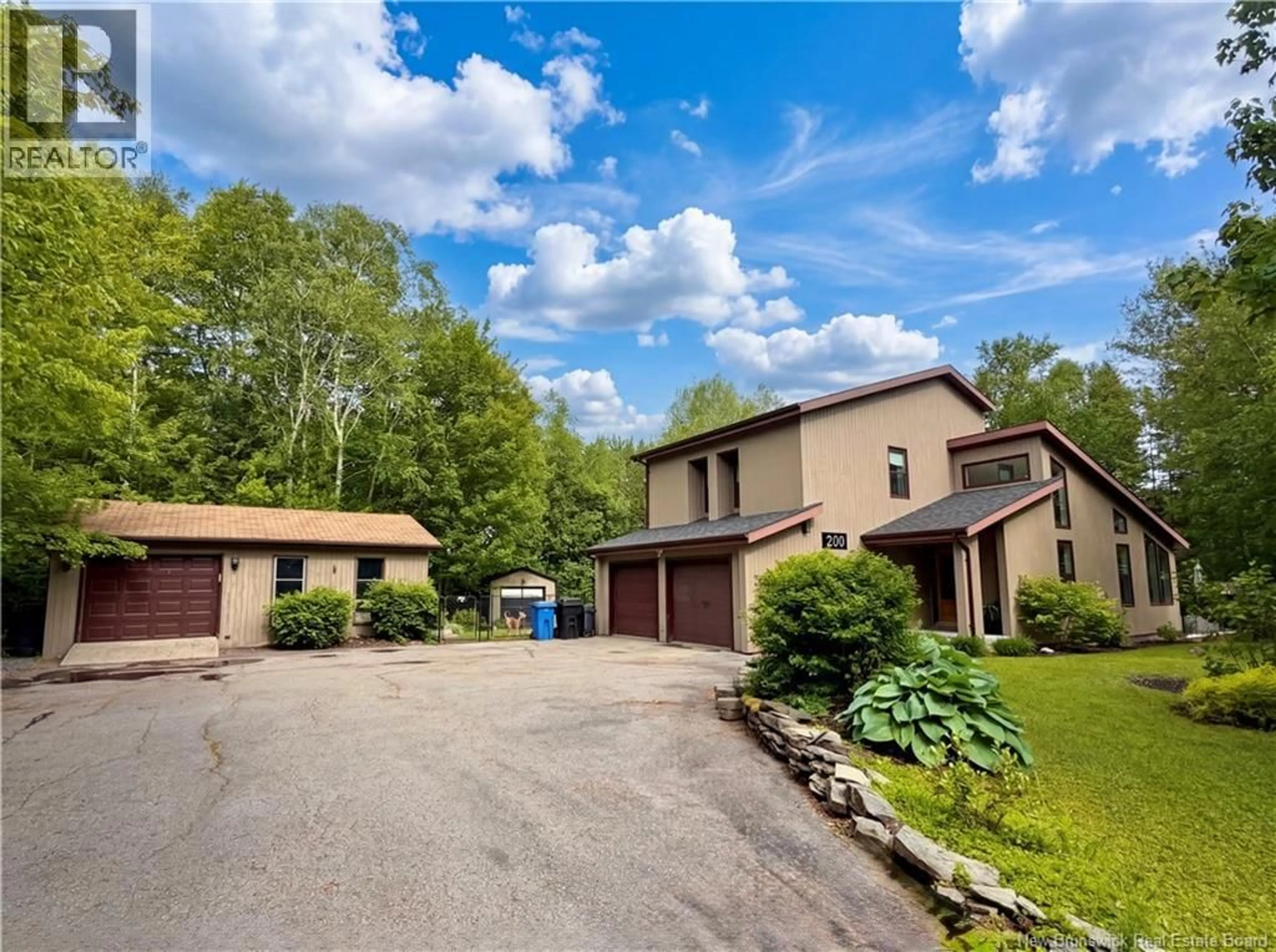 A pic from outside/outdoor area/front of a property/back of a property/a pic from drone, street for 200 ROBIN HOOD AVENUE, North Tetagouche New Brunswick E2A4Y7