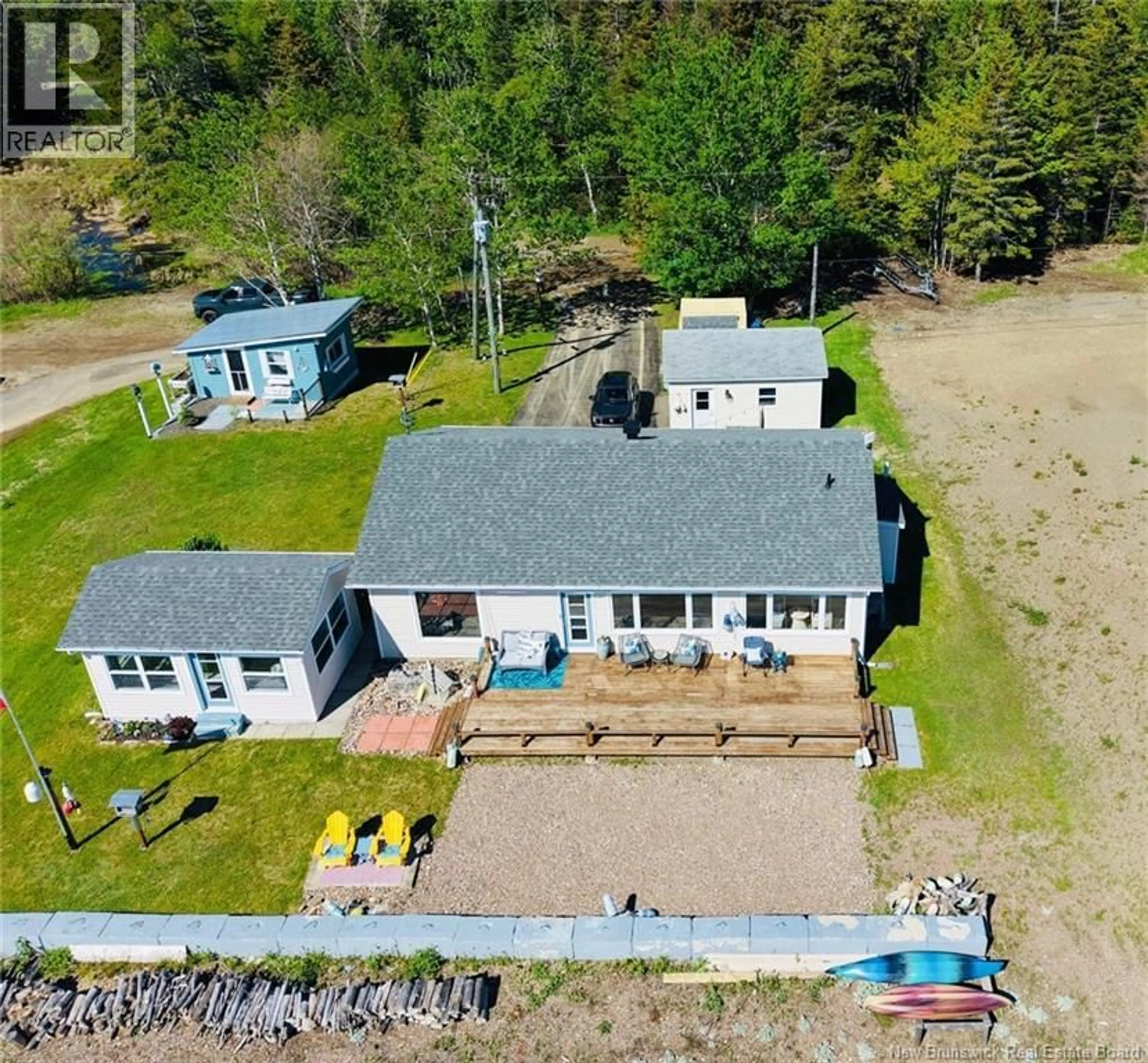 A pic from outside/outdoor area/front of a property/back of a property/a pic from drone, water/lake/river/ocean view for 421 GOULETTE POINT ROAD, Charlo New Brunswick E8E2K6