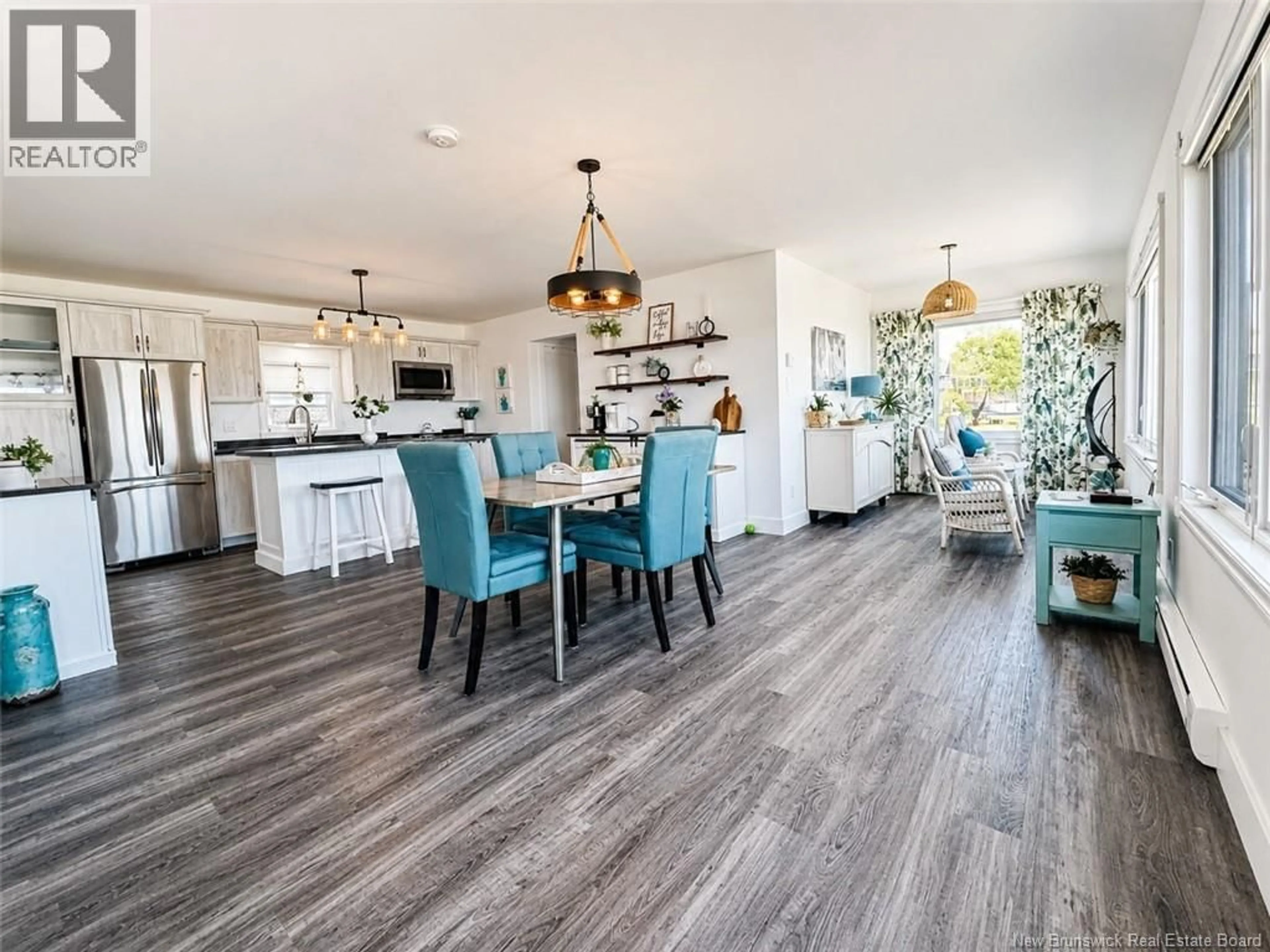 Open concept kitchen, wood/laminate floor for 421 GOULETTE POINT ROAD, Charlo New Brunswick E8E2K6
