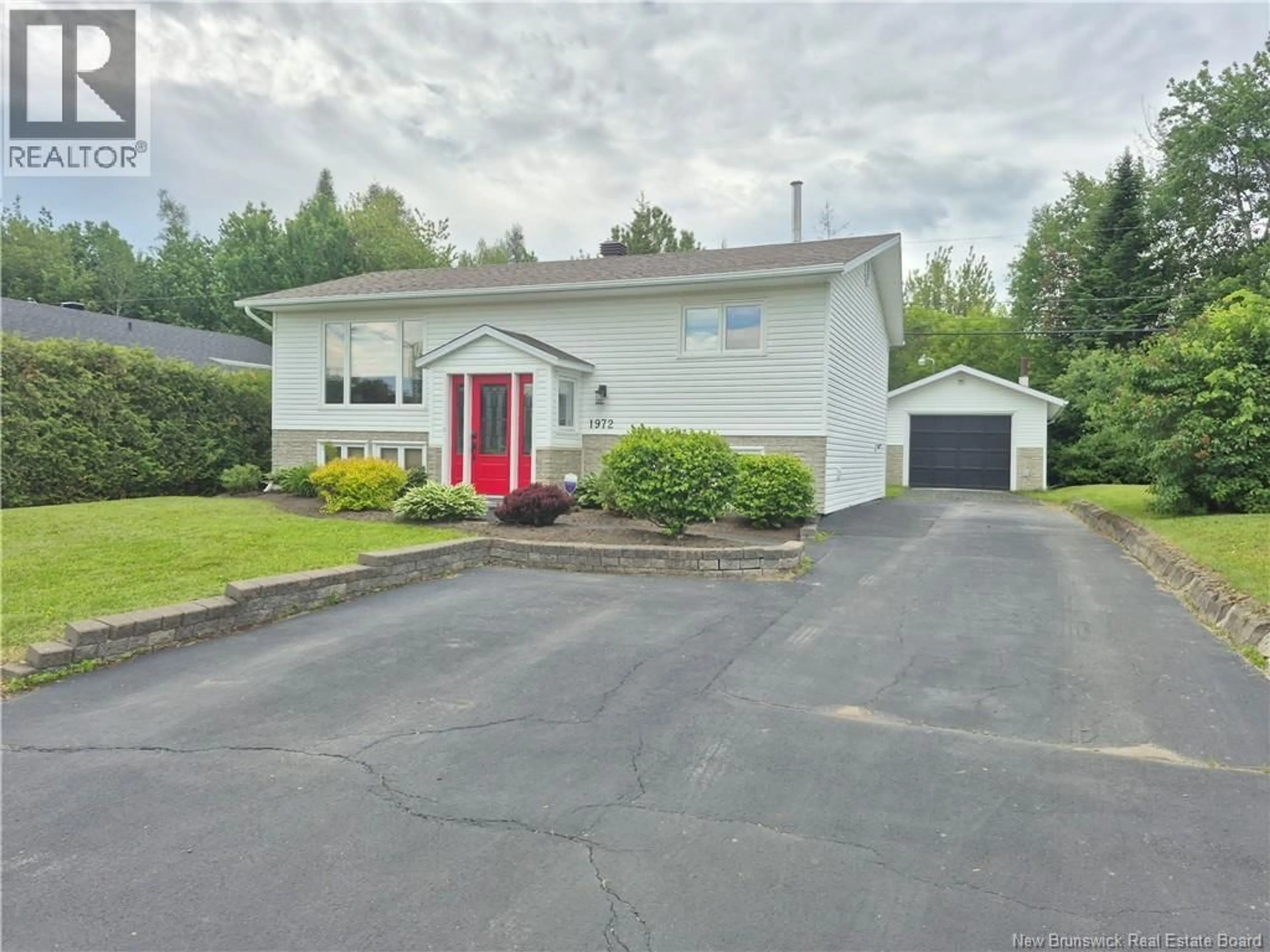 Home with vinyl exterior material, street for 1972 BRIDEAU AVENUE, Bathurst New Brunswick E2A2G8