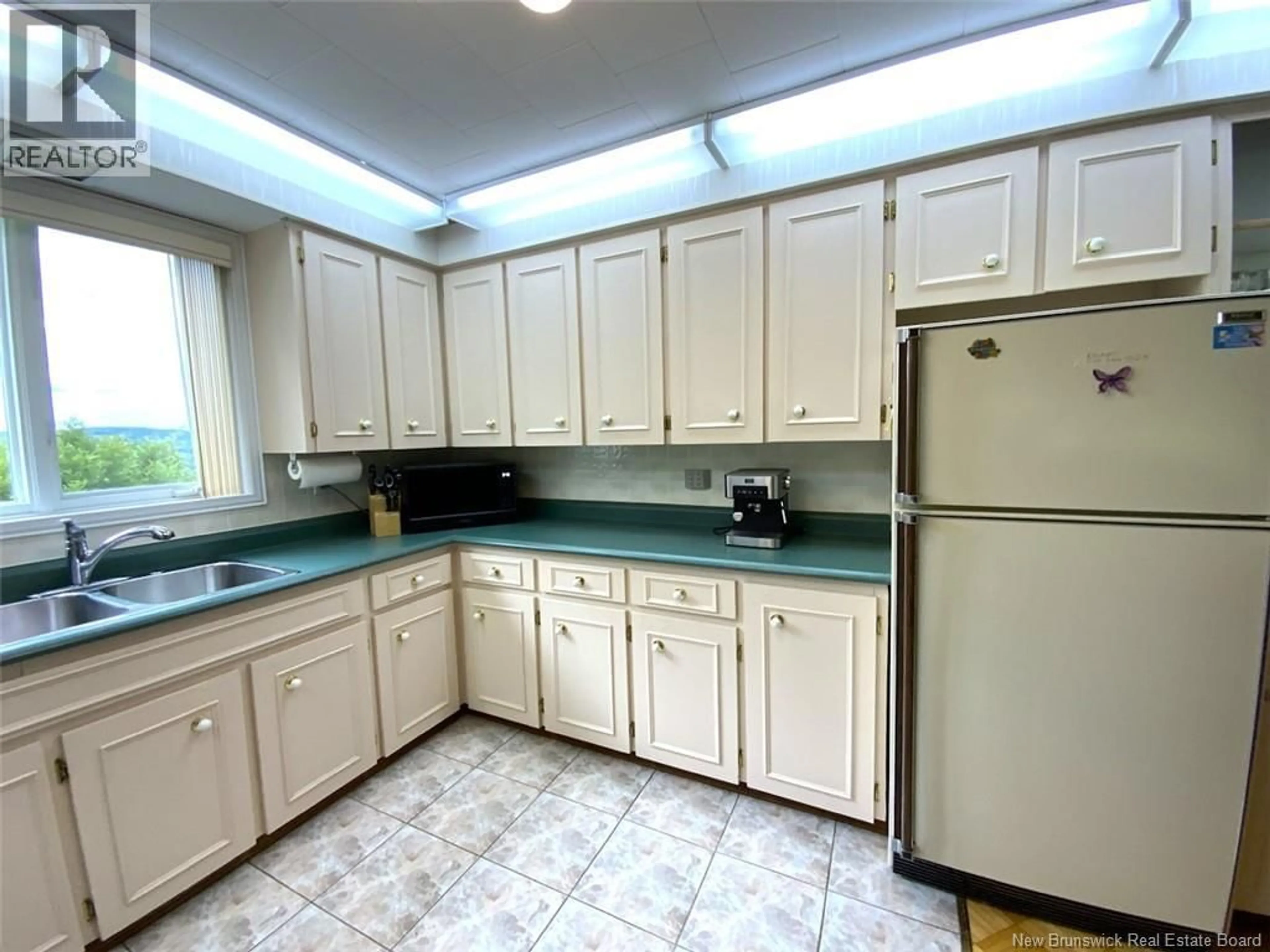 Standard kitchen, ceramic/tile floor for 103 J-GASPARD-BOUCHER AVENUE, Edmundston New Brunswick E3V1P8