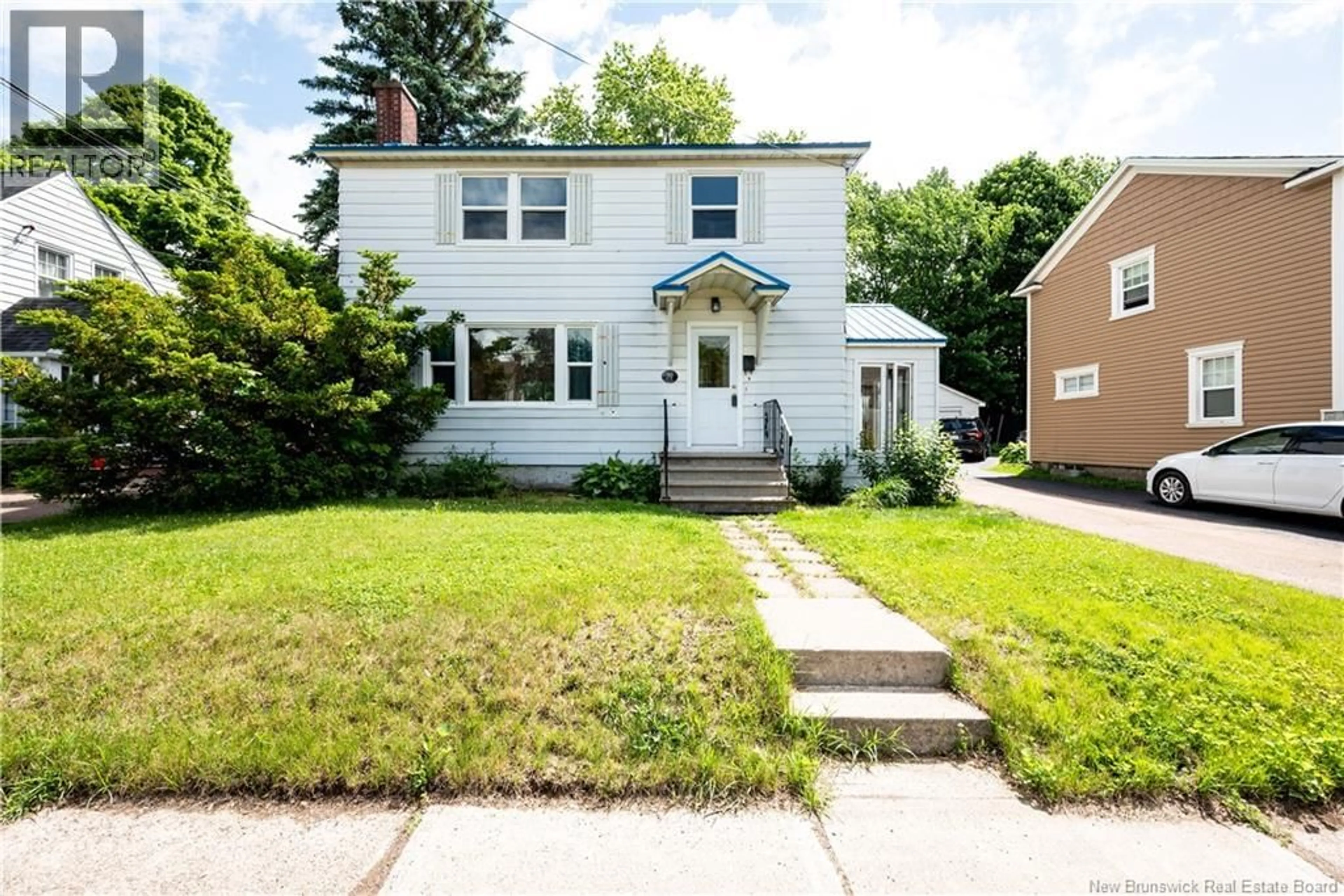 Home with vinyl exterior material, street for 79 WOODLAND DRIVE, Moncton New Brunswick E1E3C4