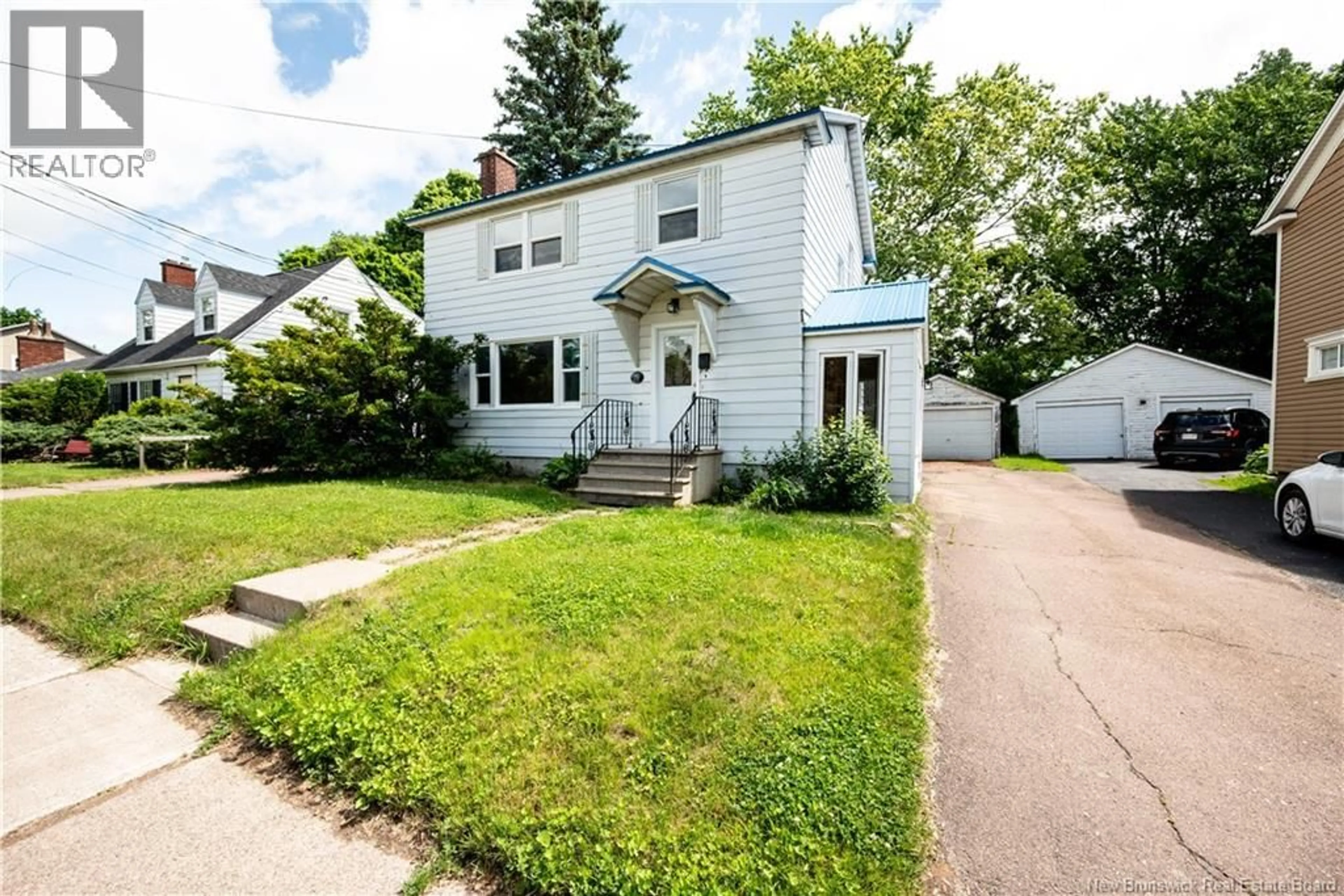 Home with vinyl exterior material, street for 79 WOODLAND DRIVE, Moncton New Brunswick E1E3C4