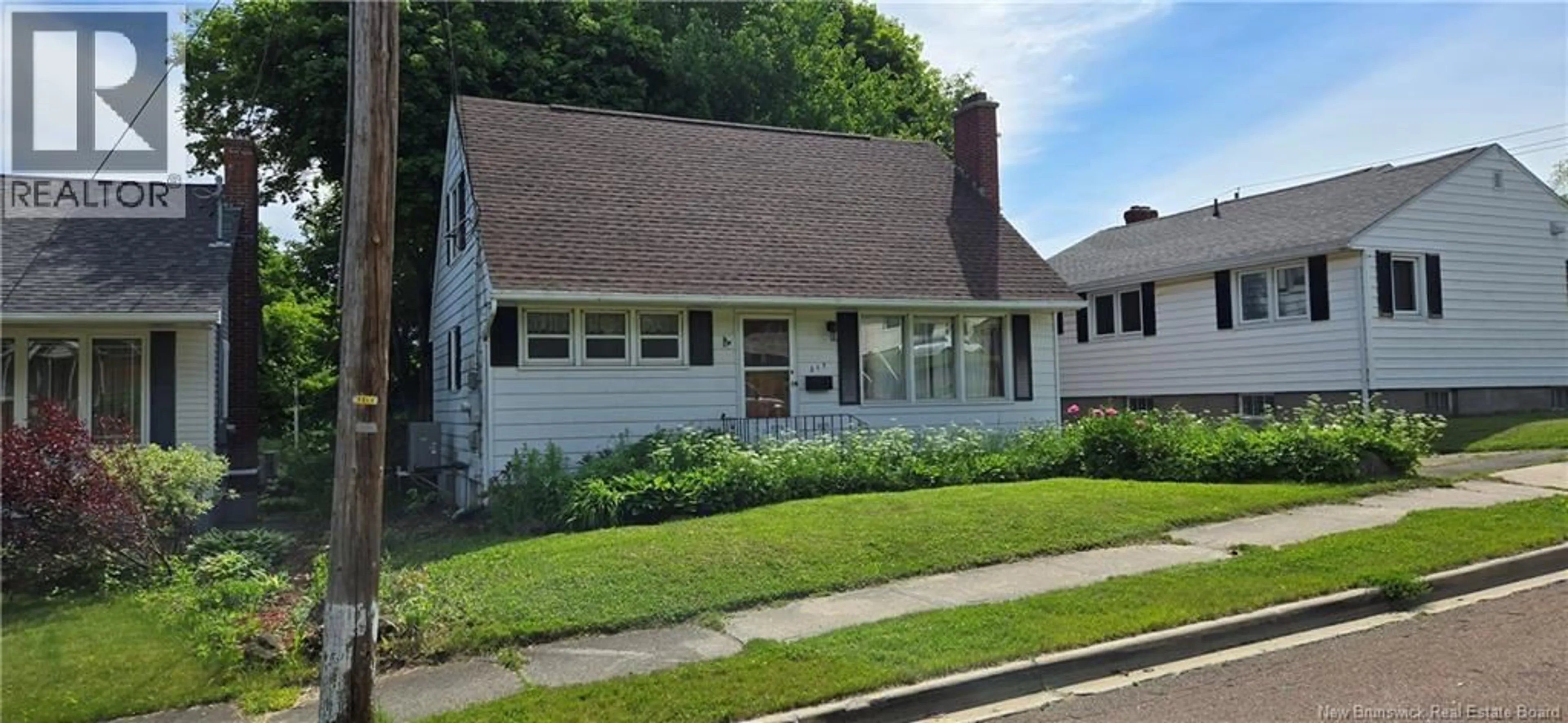 Home with vinyl exterior material, street for 217 MAPLE STREET, Moncton New Brunswick E1C6A7