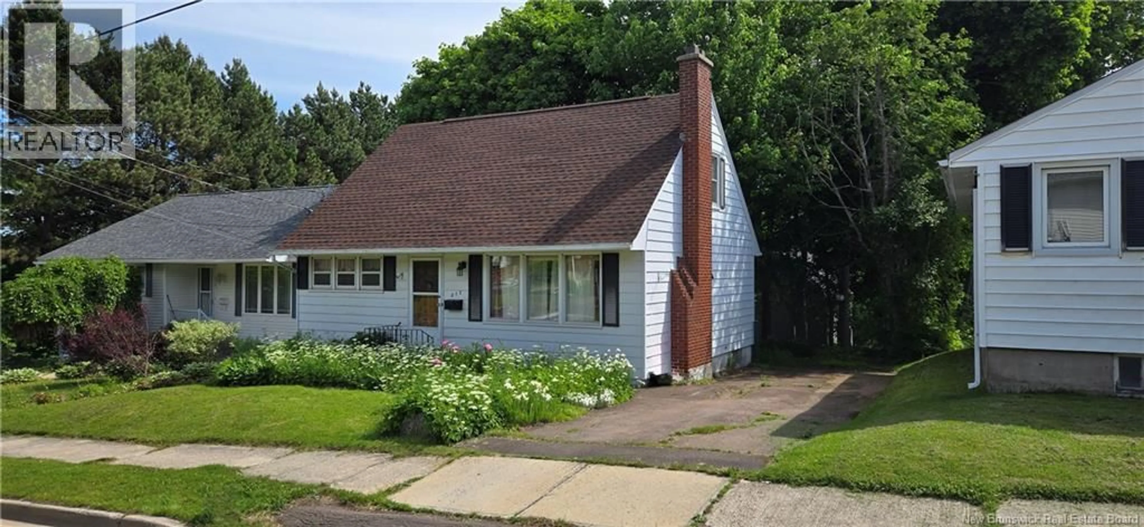 Home with vinyl exterior material, street for 217 MAPLE STREET, Moncton New Brunswick E1C6A7