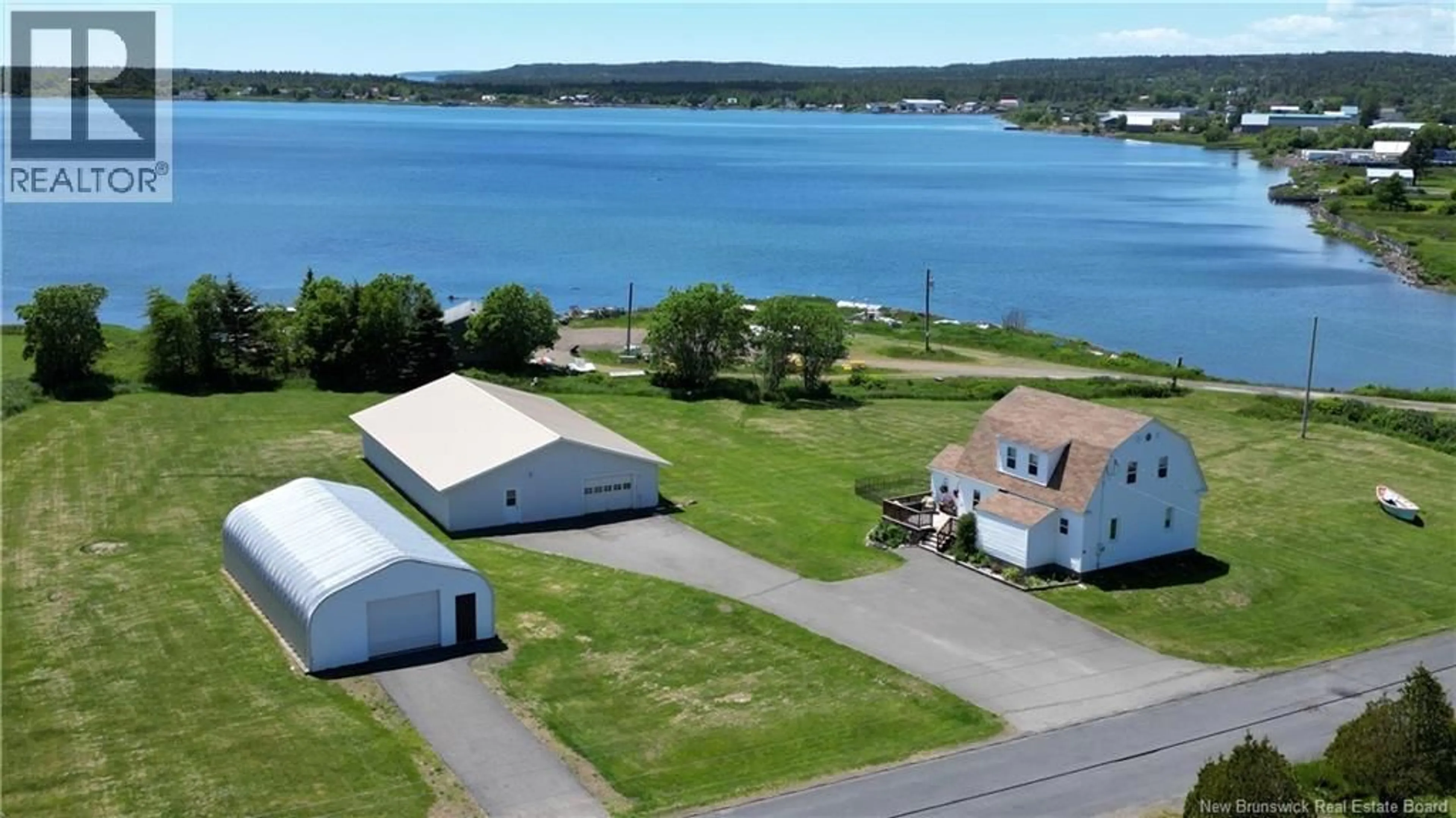 A pic from outside/outdoor area/front of a property/back of a property/a pic from drone, water/lake/river/ocean view for 14 THOROUGHFARE ROAD, Grand Manan New Brunswick E5G1G6
