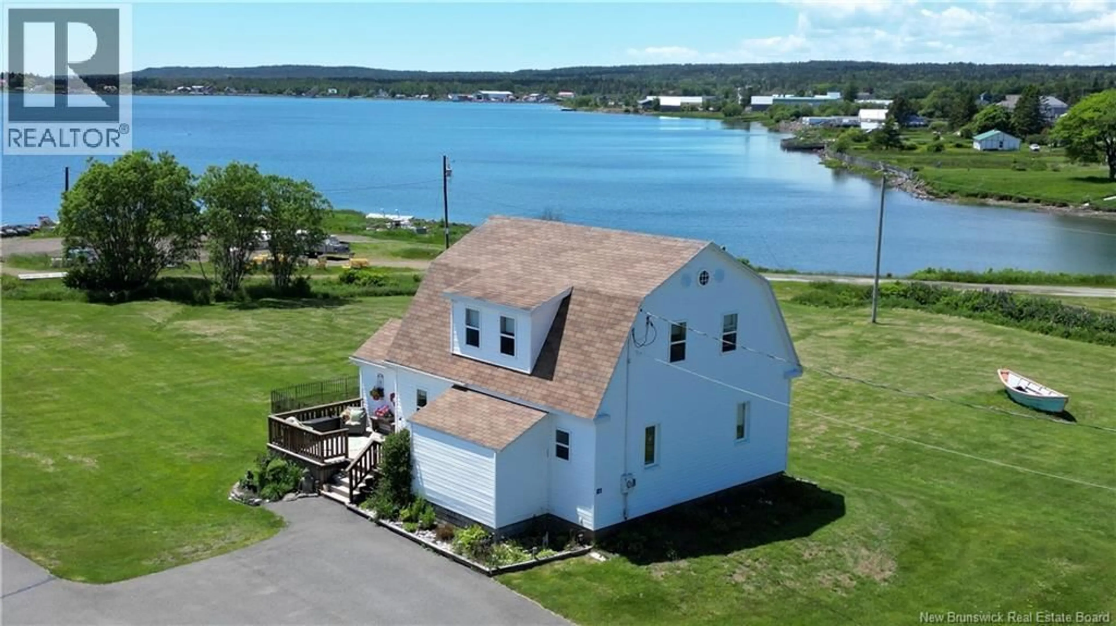 A pic from outside/outdoor area/front of a property/back of a property/a pic from drone, water/lake/river/ocean view for 14 THOROUGHFARE ROAD, Grand Manan New Brunswick E5G1G6