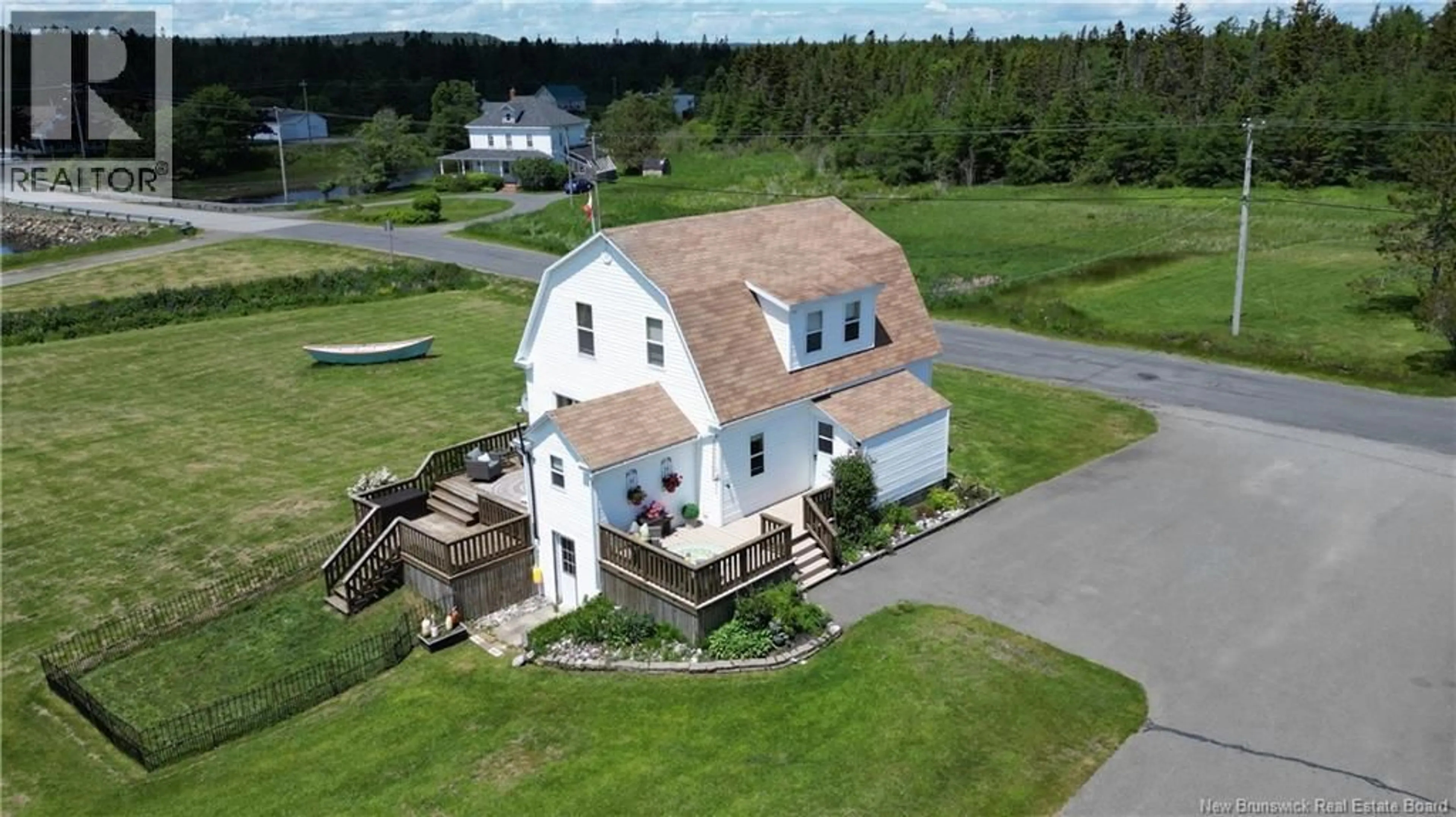 A pic from outside/outdoor area/front of a property/back of a property/a pic from drone, unknown for 14 THOROUGHFARE ROAD, Grand Manan New Brunswick E5G1G6